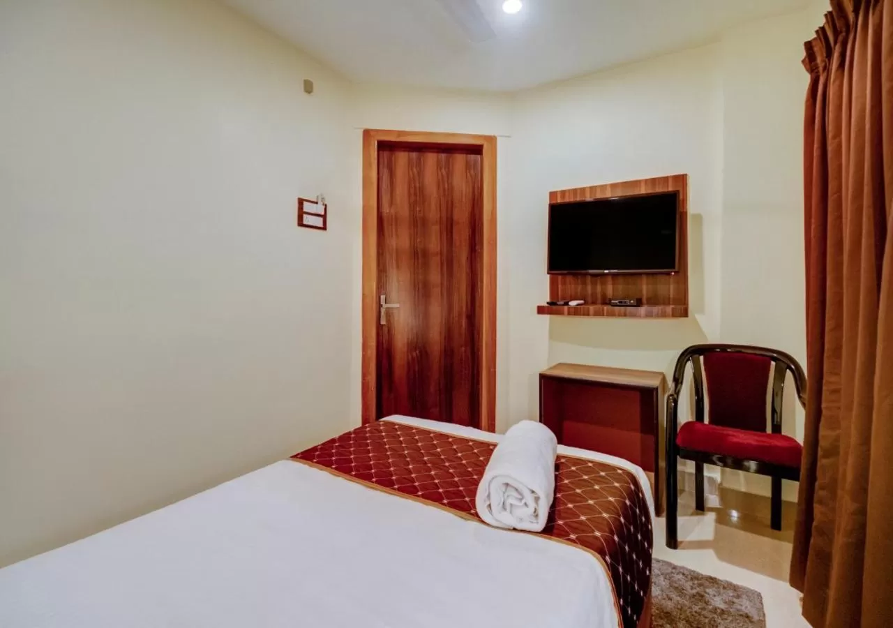 Bed in Hotel Sai Rain Tree