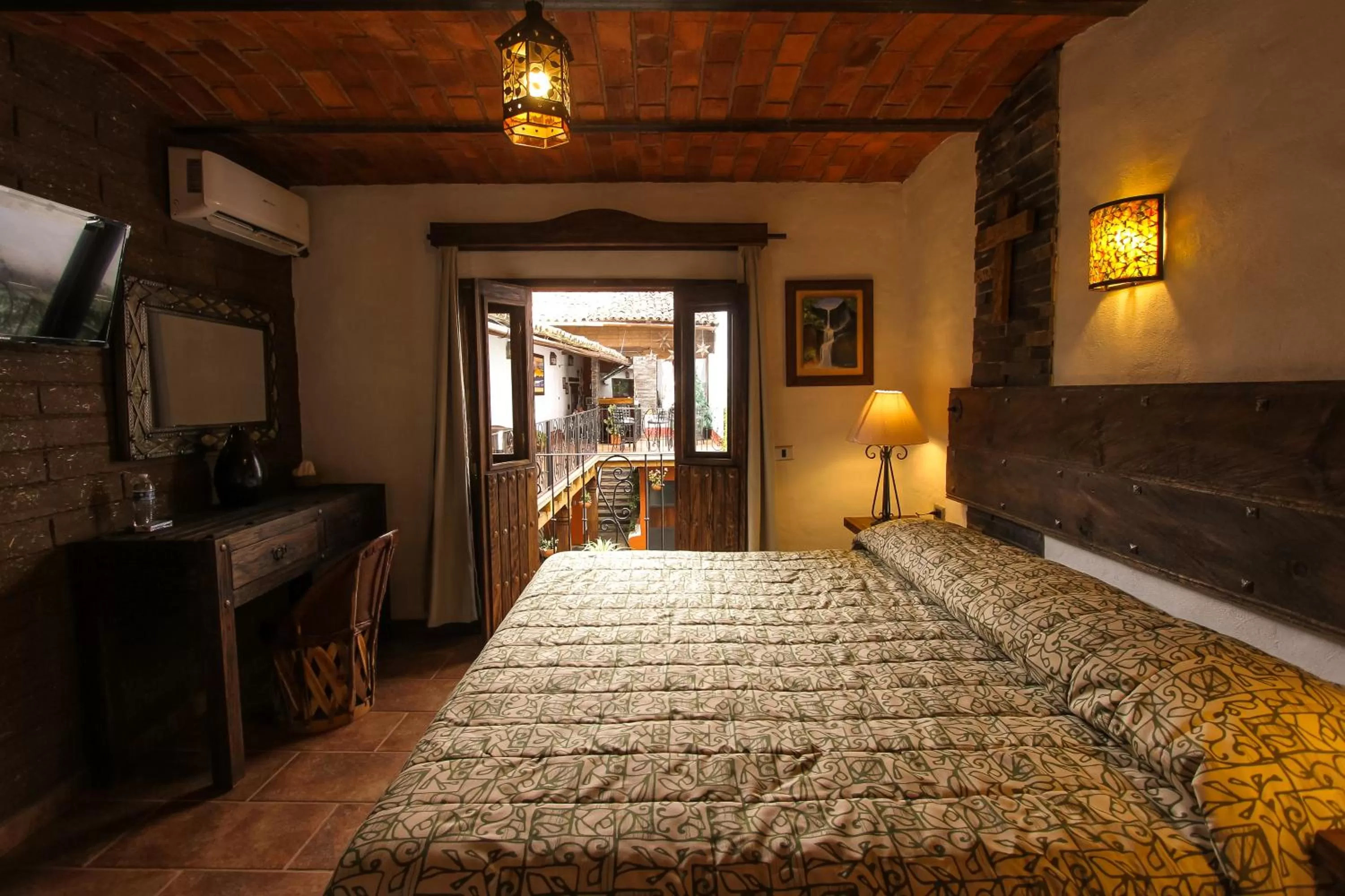 Photo of the whole room, Bed in Hotel Mi Pueblito Tapalpa