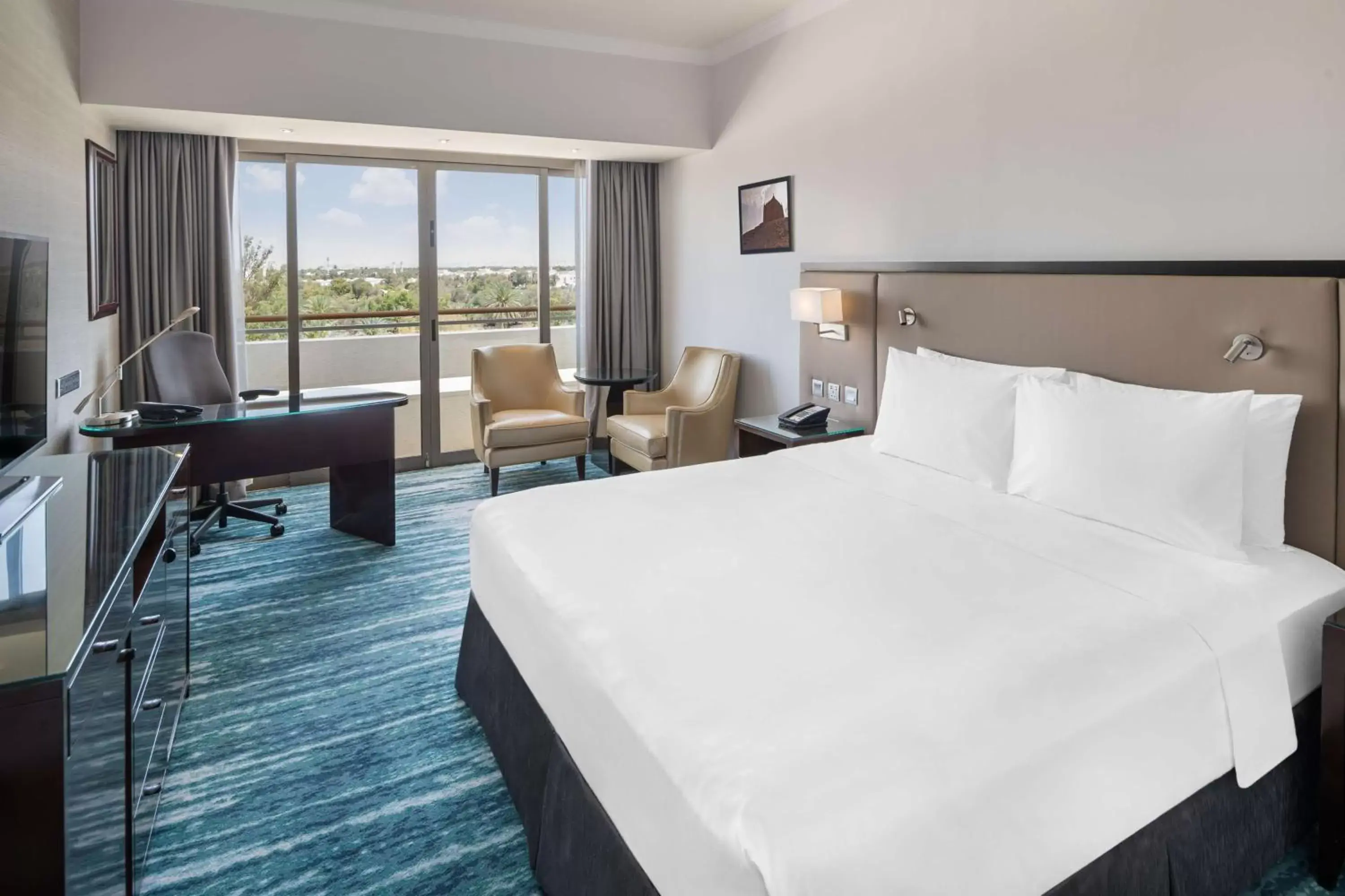 Junior Suite - complimentary access to Cobra Waterslide in Radisson Blu Hotel & Resort, Al Ain Junior Suite - complimentary access to Cobra Waterslide in Radisson Blu Hotel & Resort, Al Ain