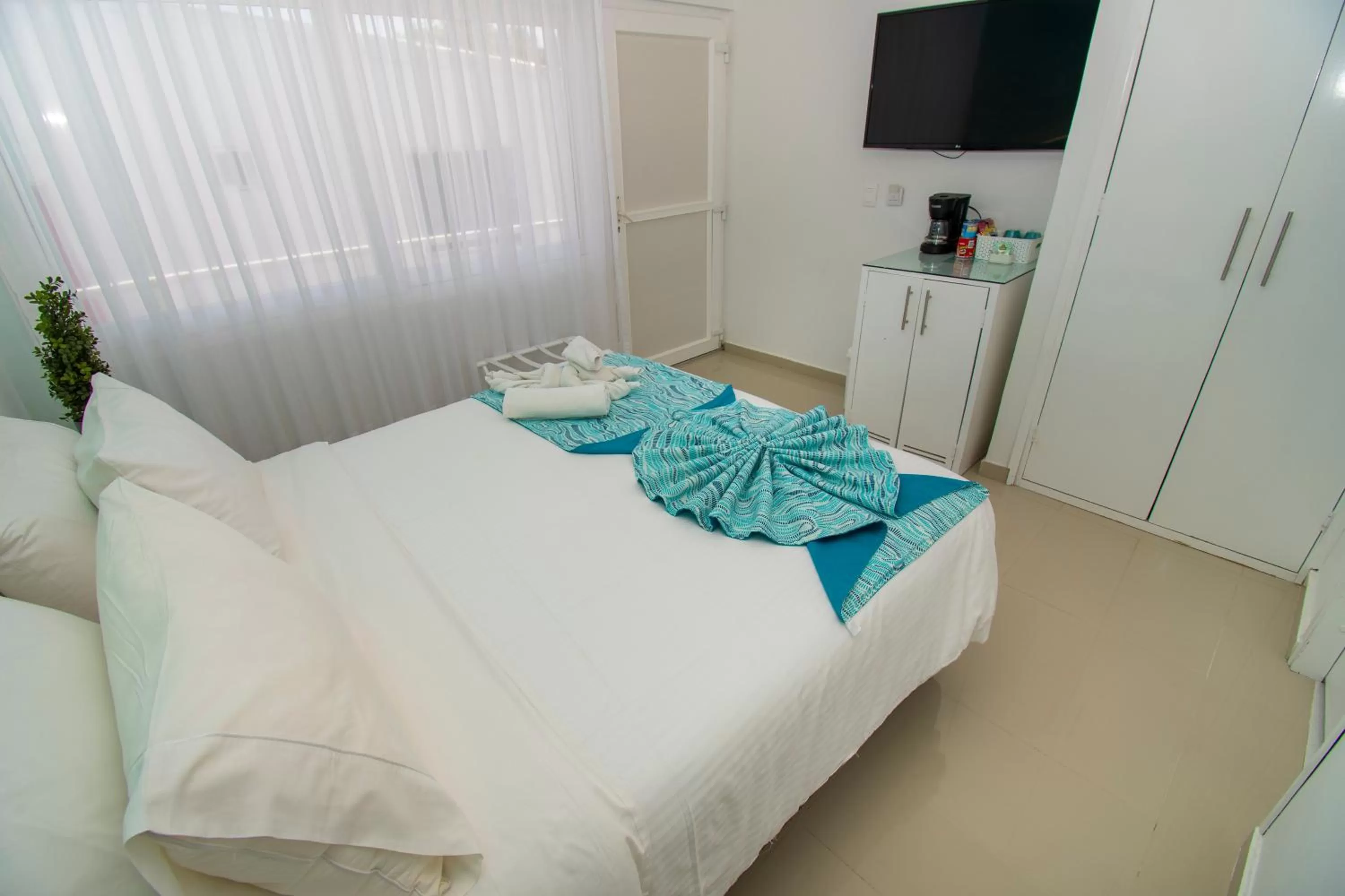 Photo of the whole room, Bed in Hotel San Luis Place By Dorado