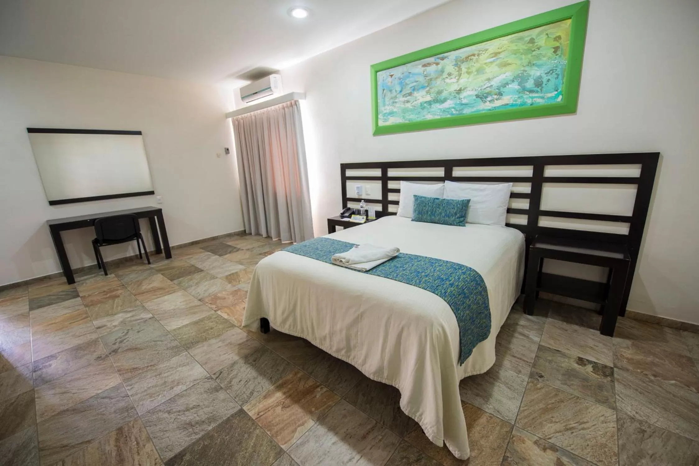 Bed in Hotel Andiroba Palace