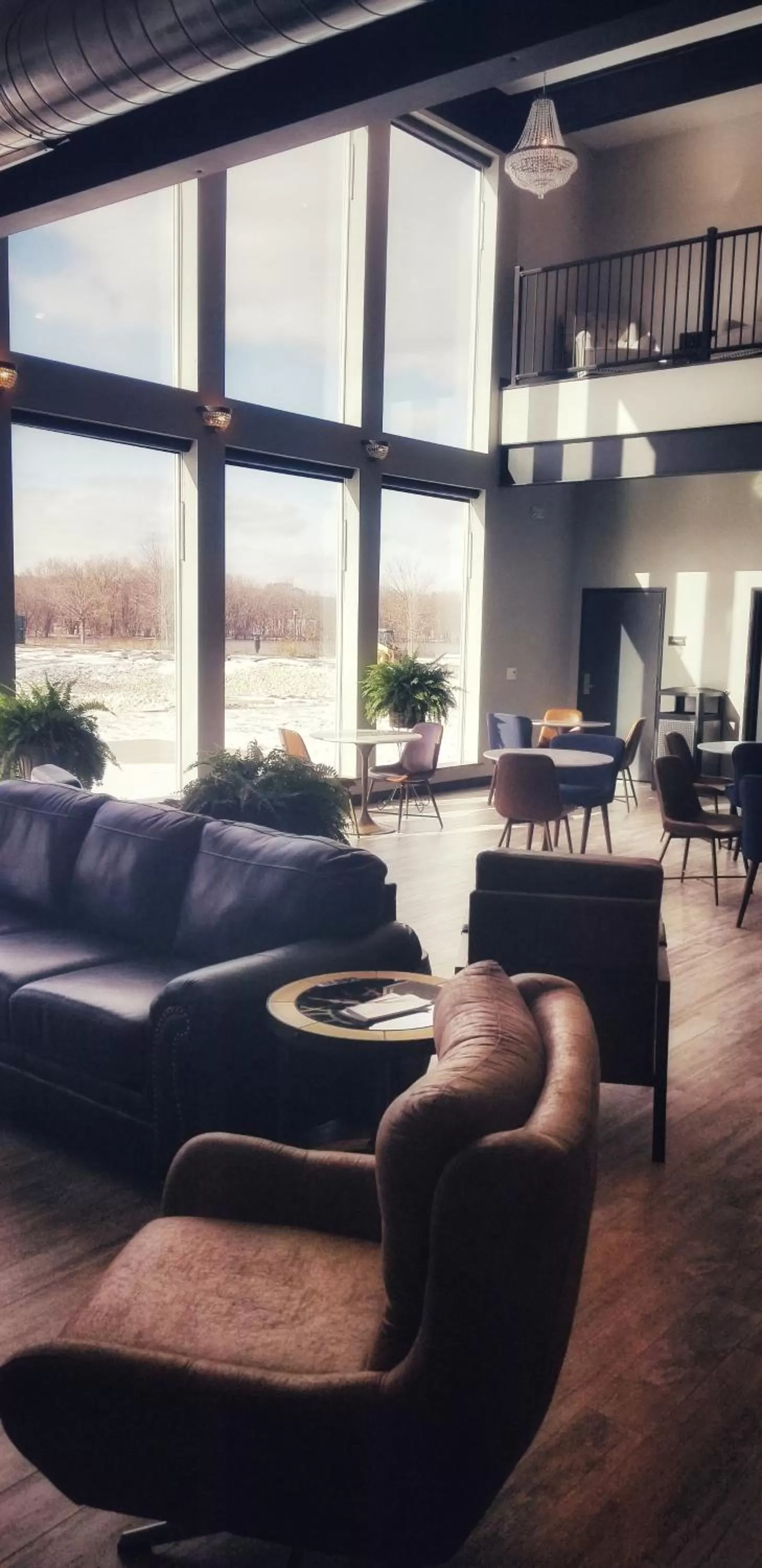 Communal lounge/ TV room in Waterfront Hotel