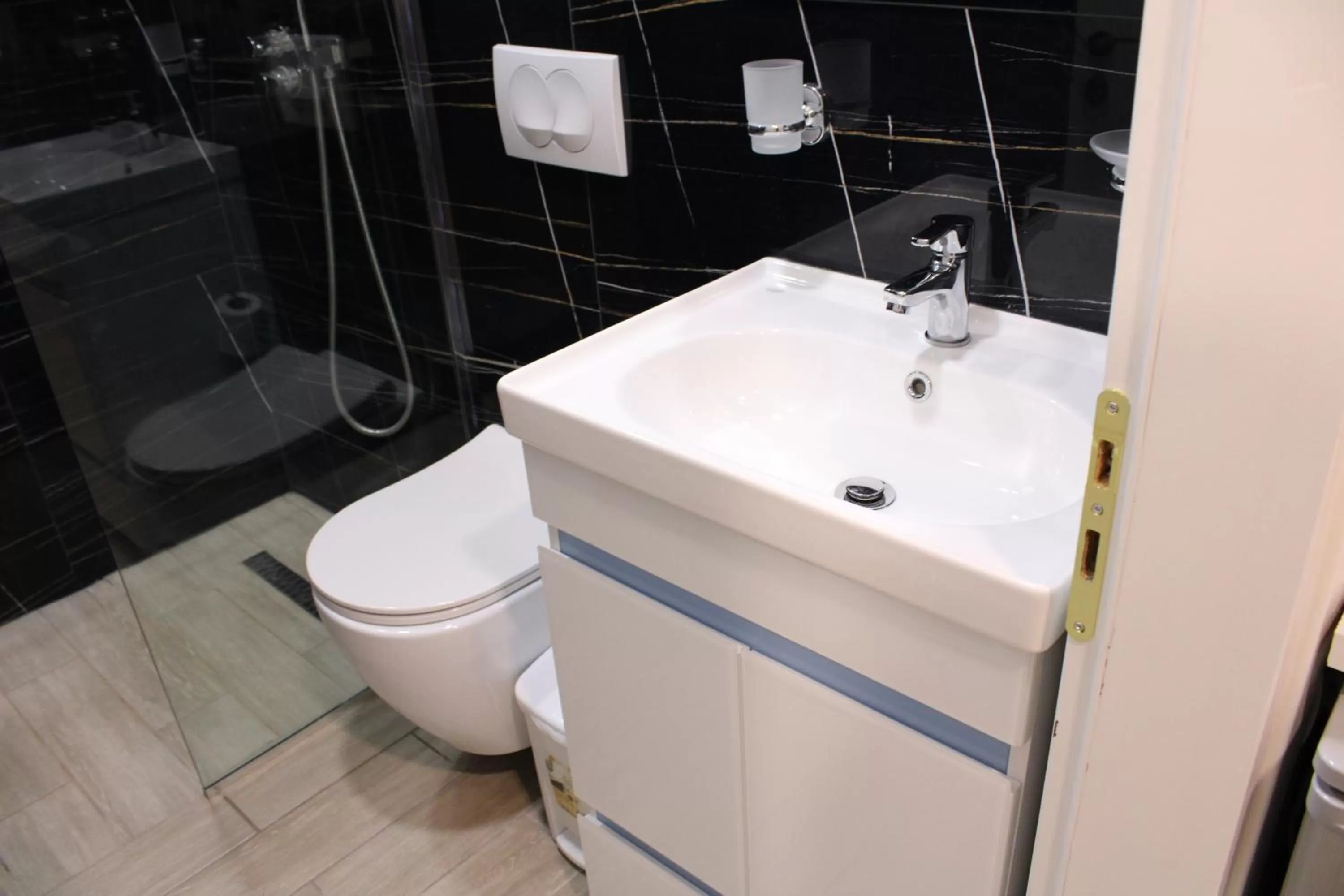 Bathroom in Aphrodite Garden Rooms & Apartment