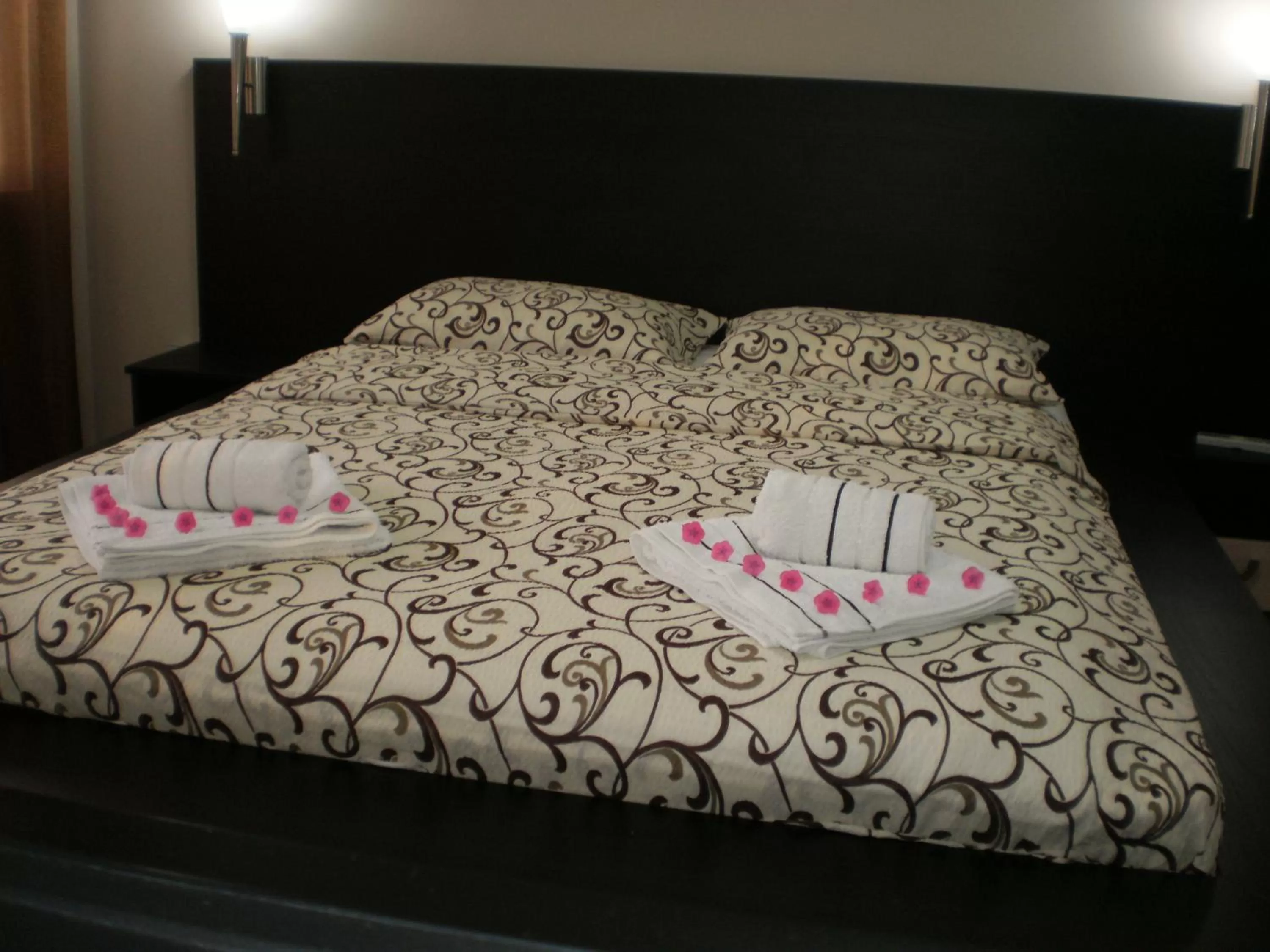 Bed in Garni Hotel Kaća