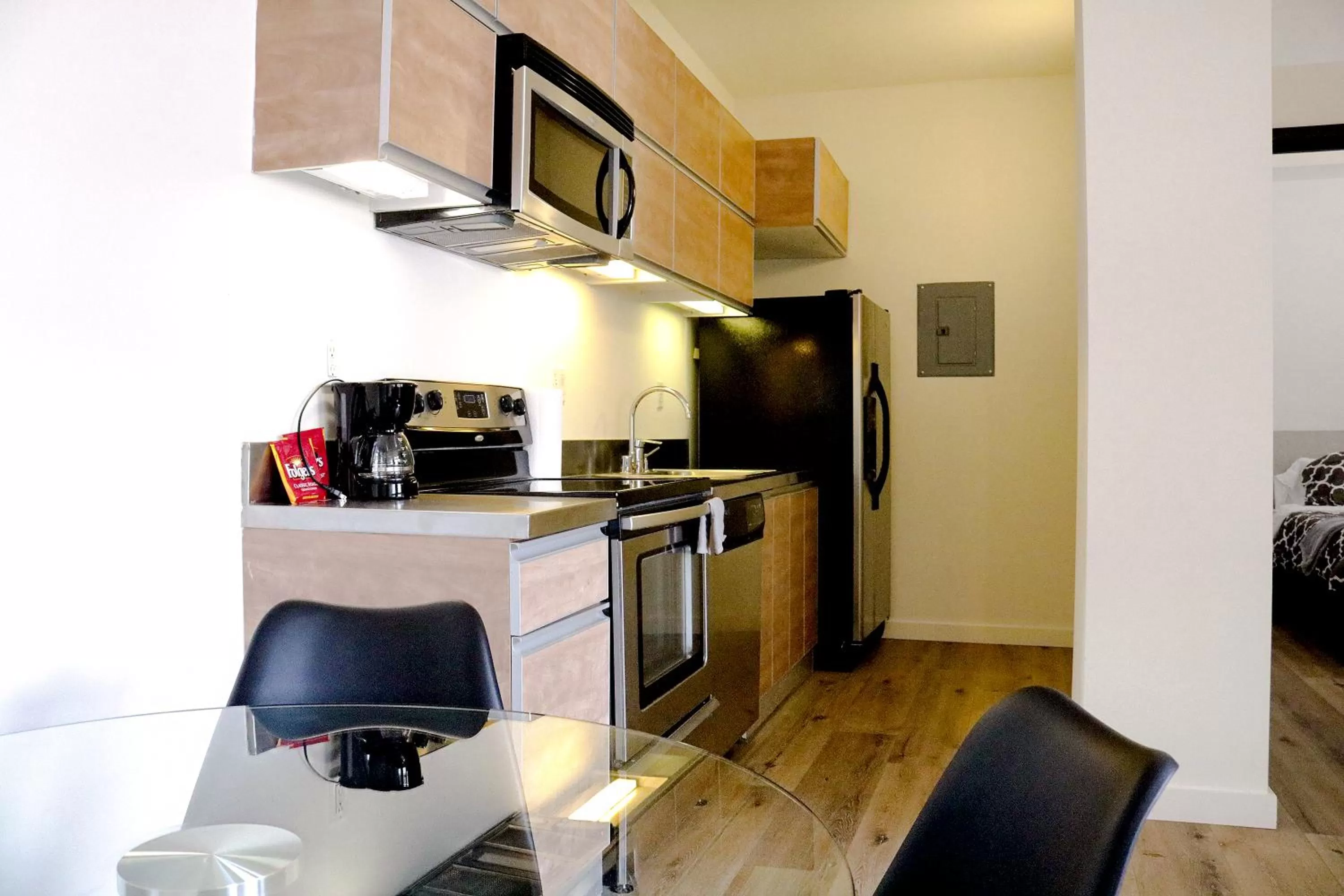 Kitchen/Kitchenette in The Haas Suites