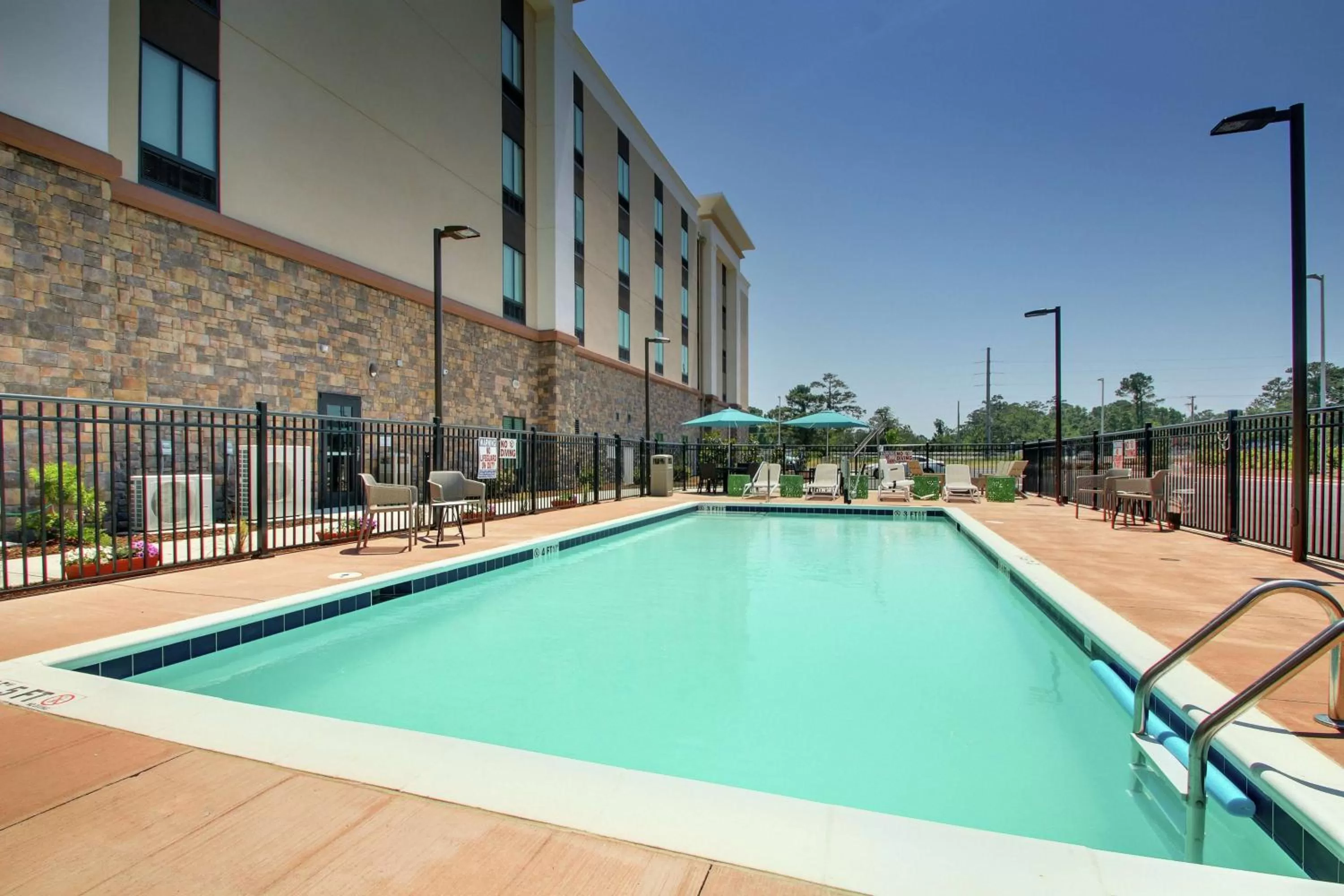 Pool view in Hampton Inn & Suites By Hilton Southport