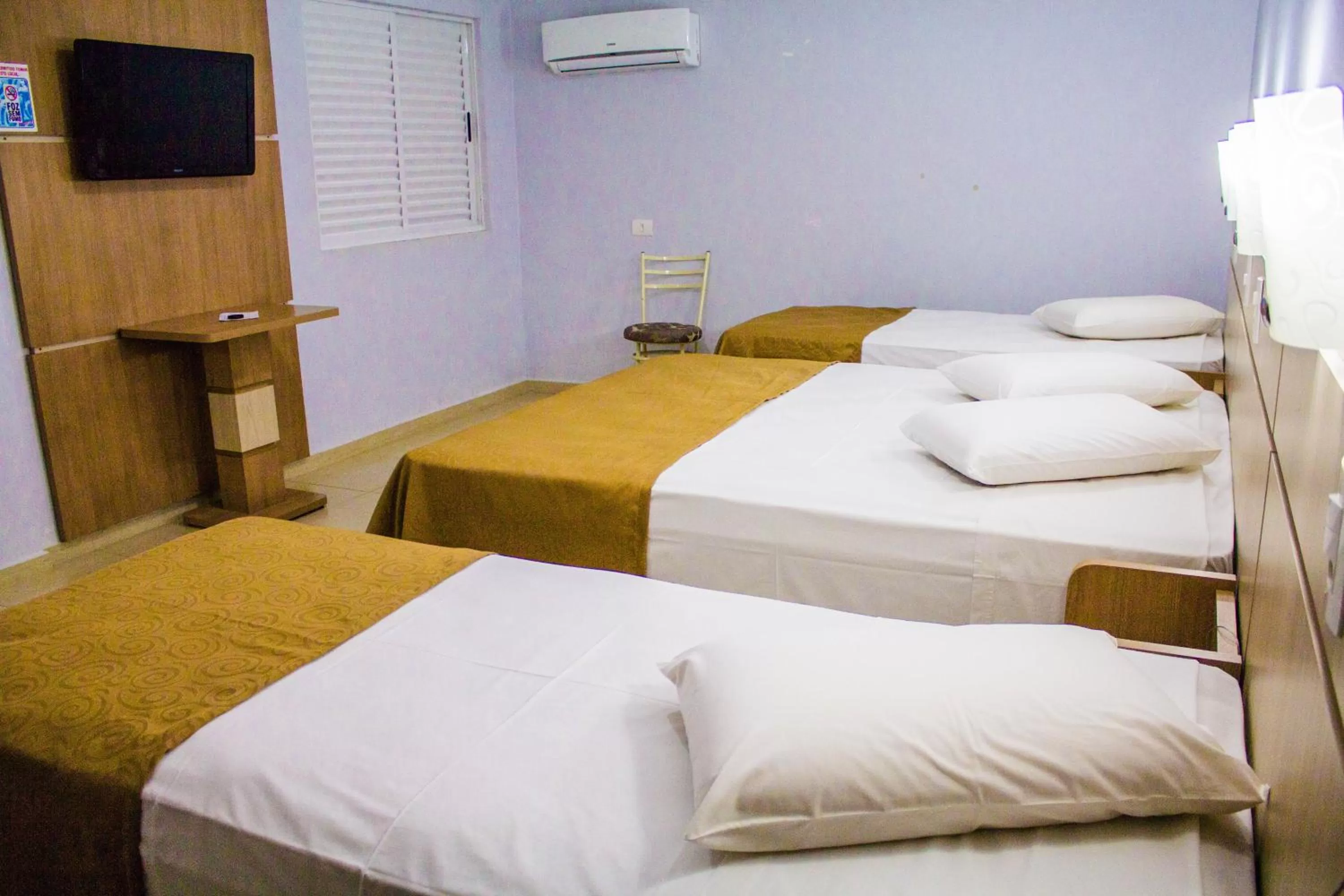 Bed in Hotel Baviera Iguassu