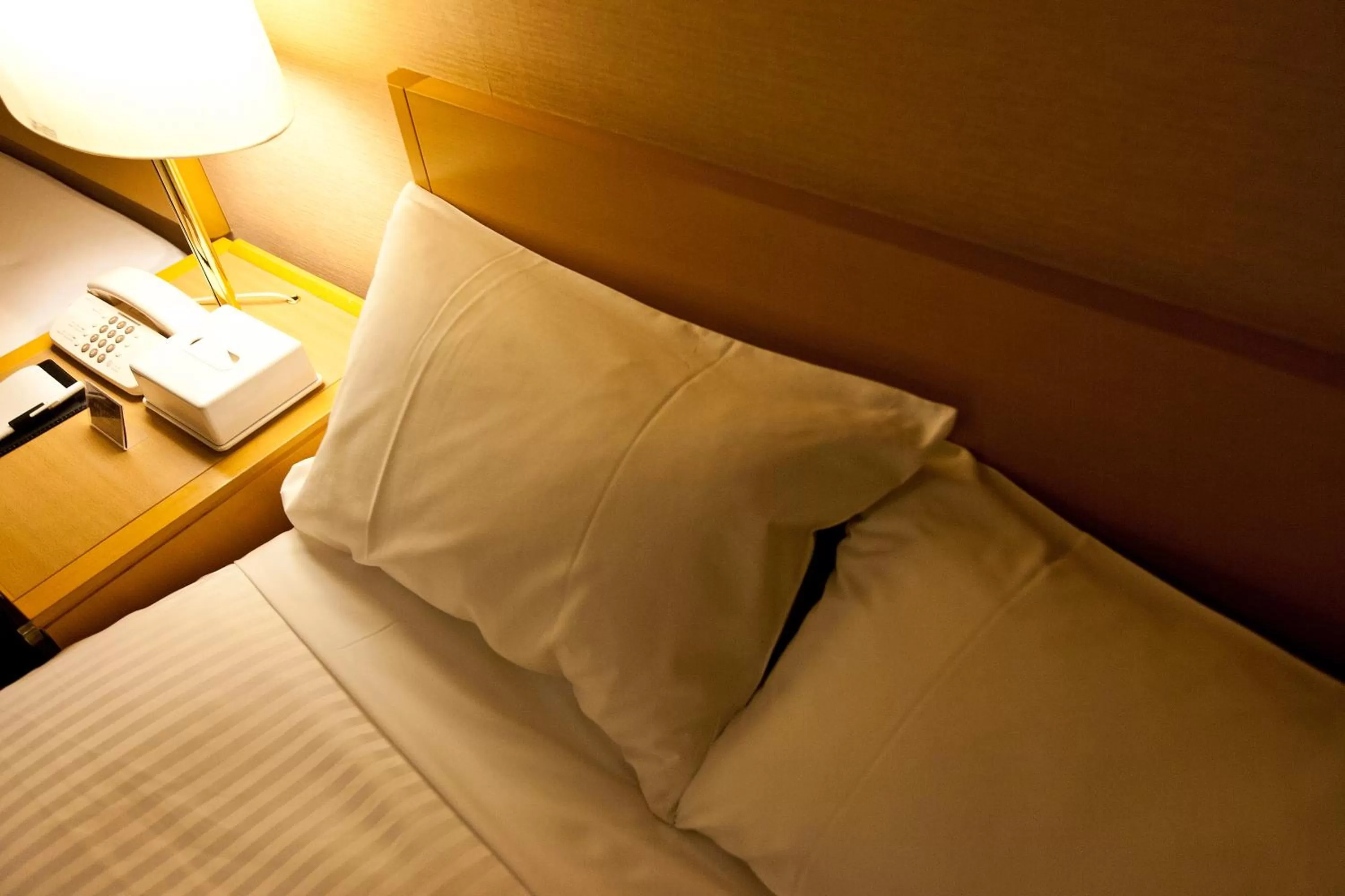 Bed in Sotetsu Fresa Inn Tokyo Tamachi