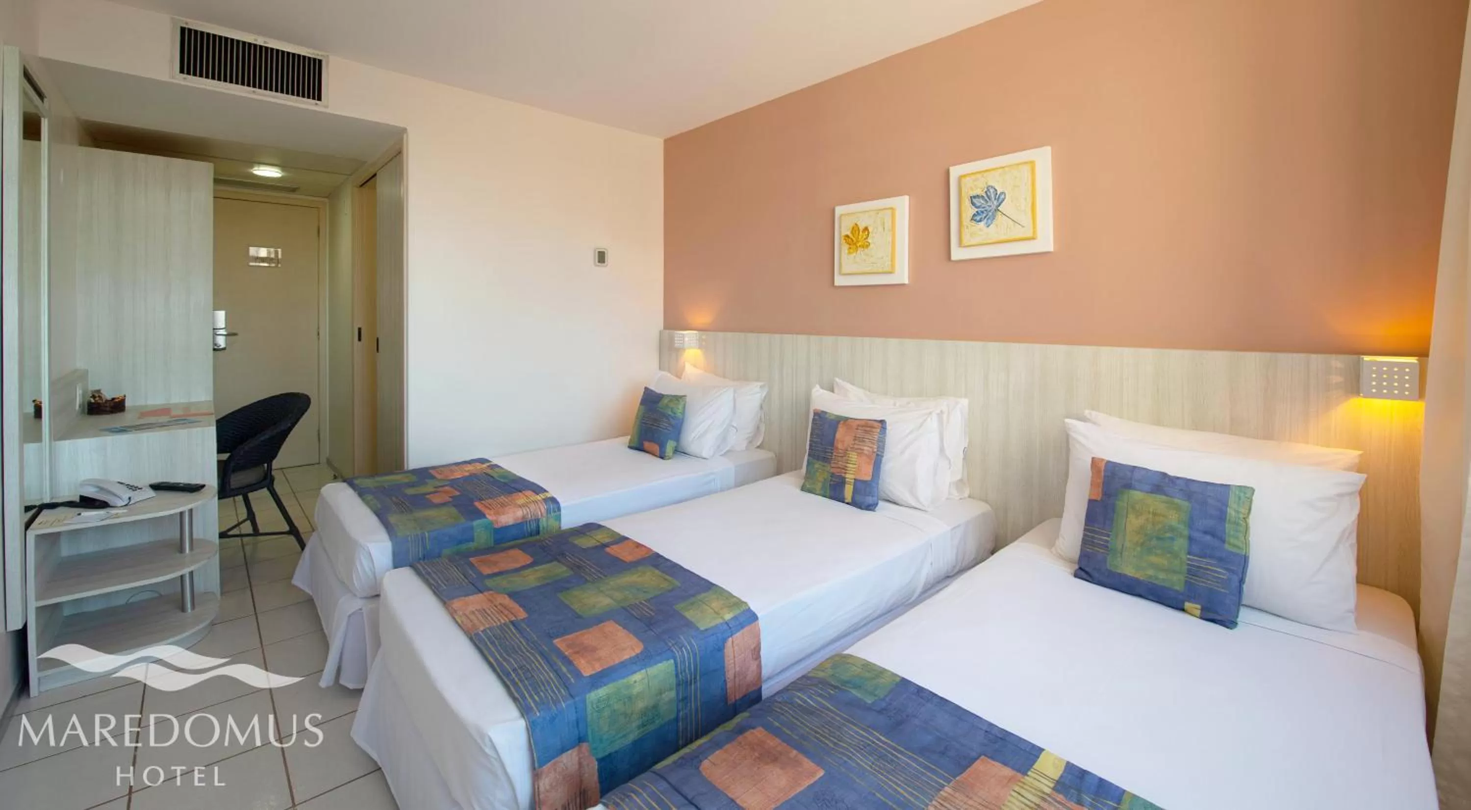 Bed in Maredomus Hotel