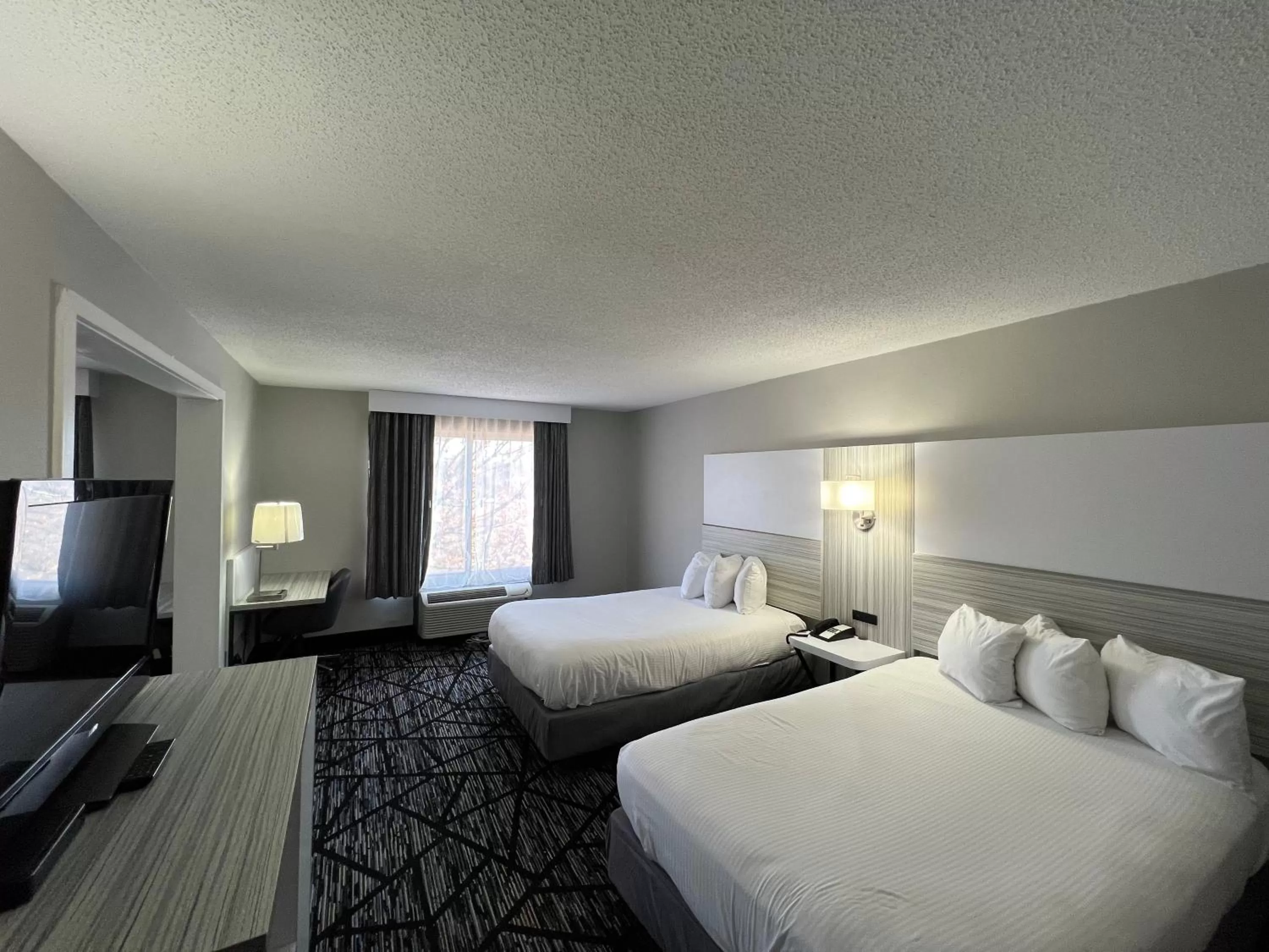 Bed in Baymont by Wyndham Peoria