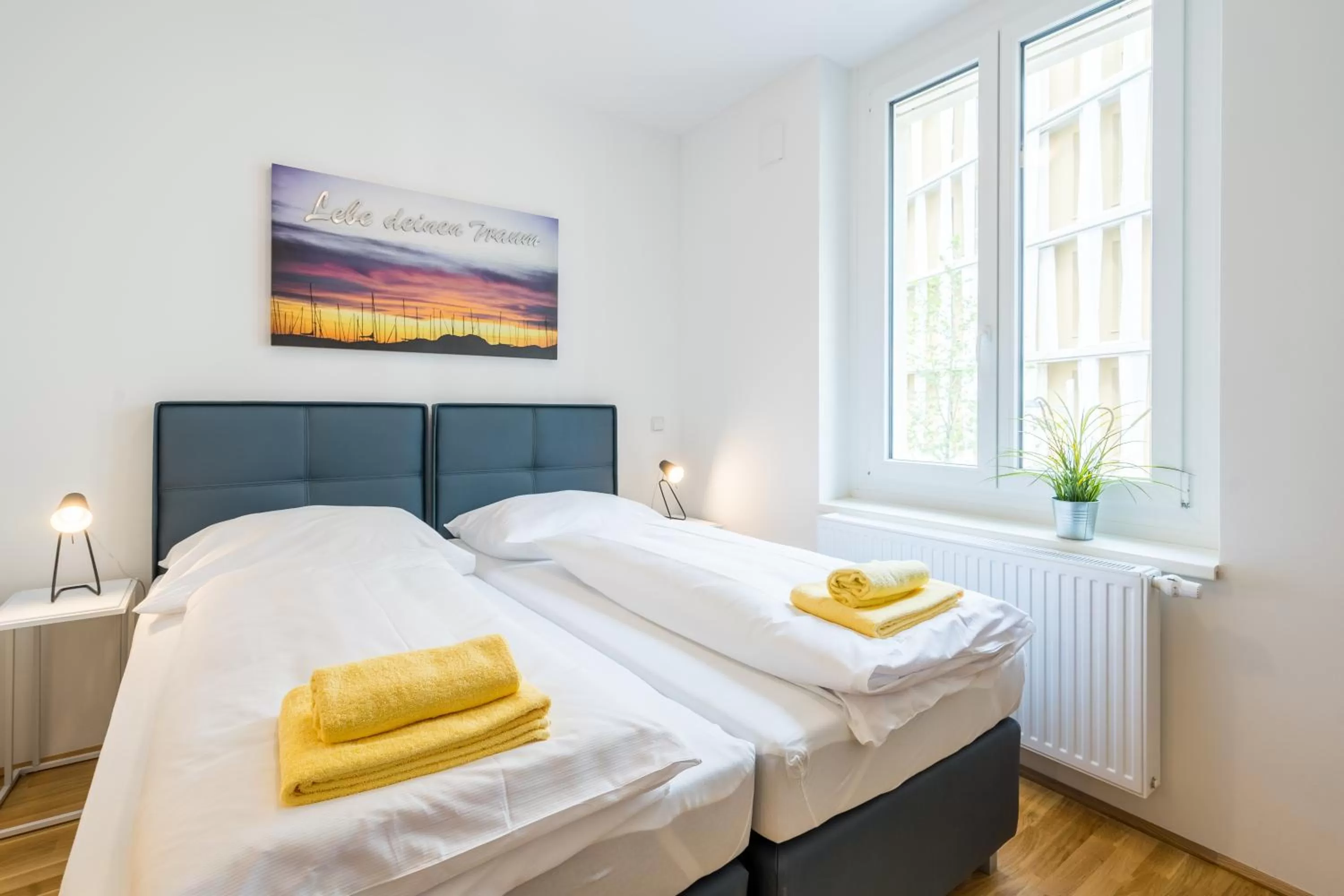 Bed in FeelGood Apartments SmartLiving | contactless check-in