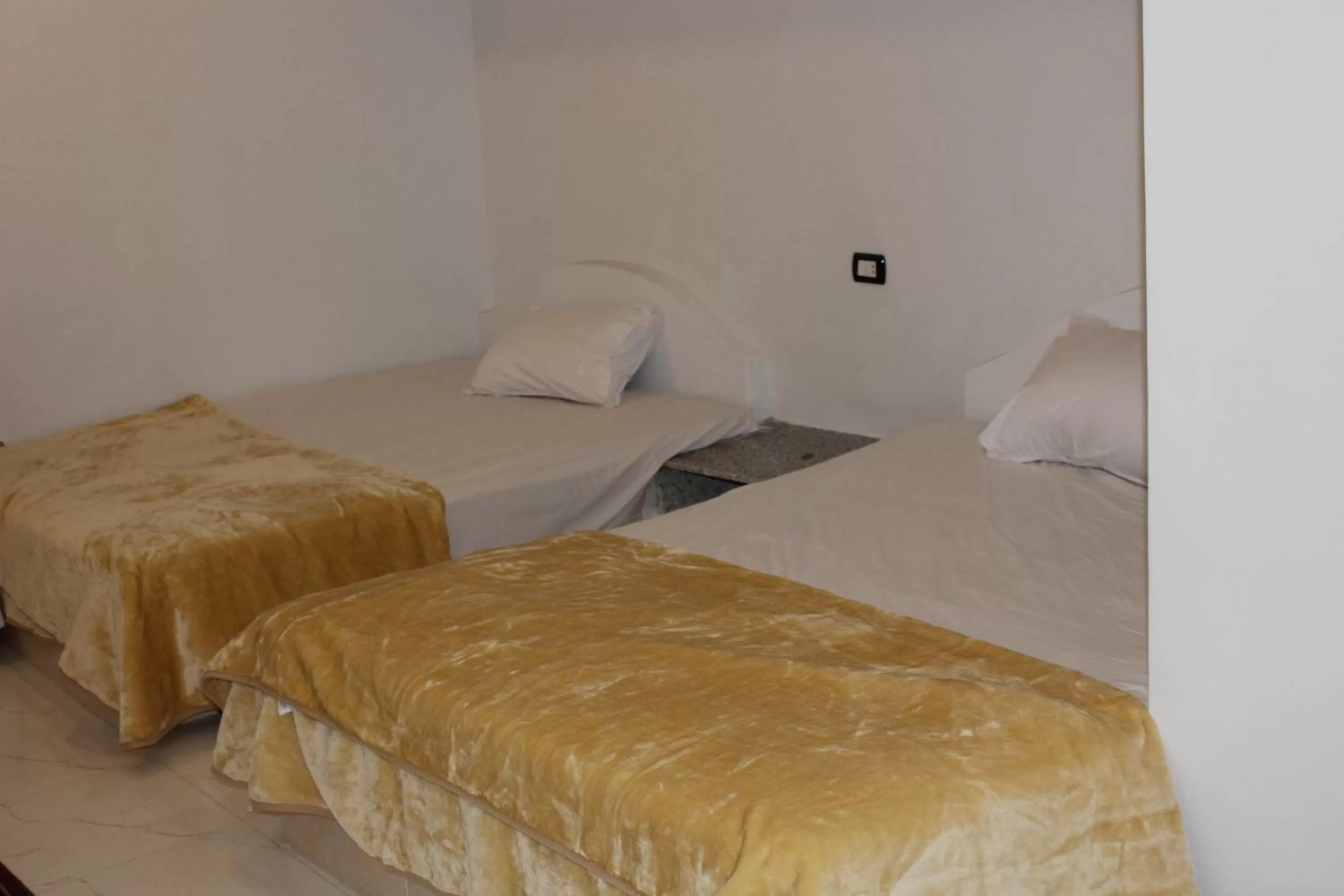 Bed in Mama Africa Apts & Studios