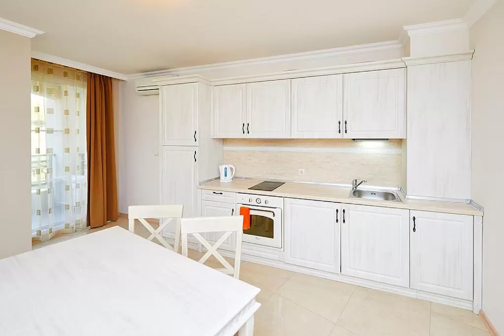 Kitchen or kitchenette, Bed in Penelopa Palace Apart Hotel & SPA