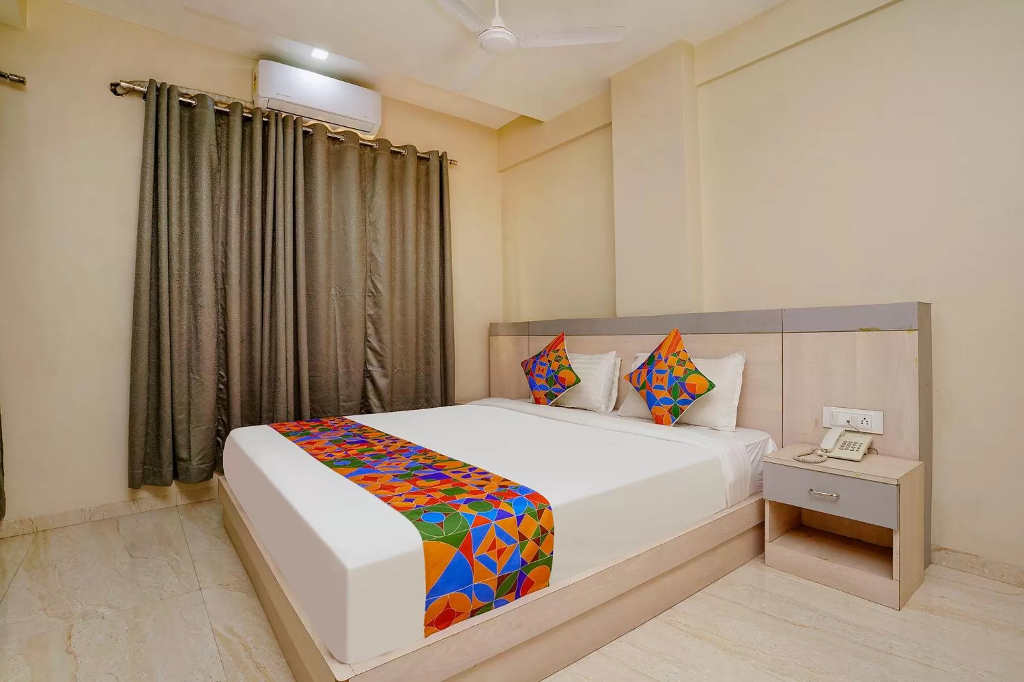 Bed in FabHotel Bhiwandi Palace