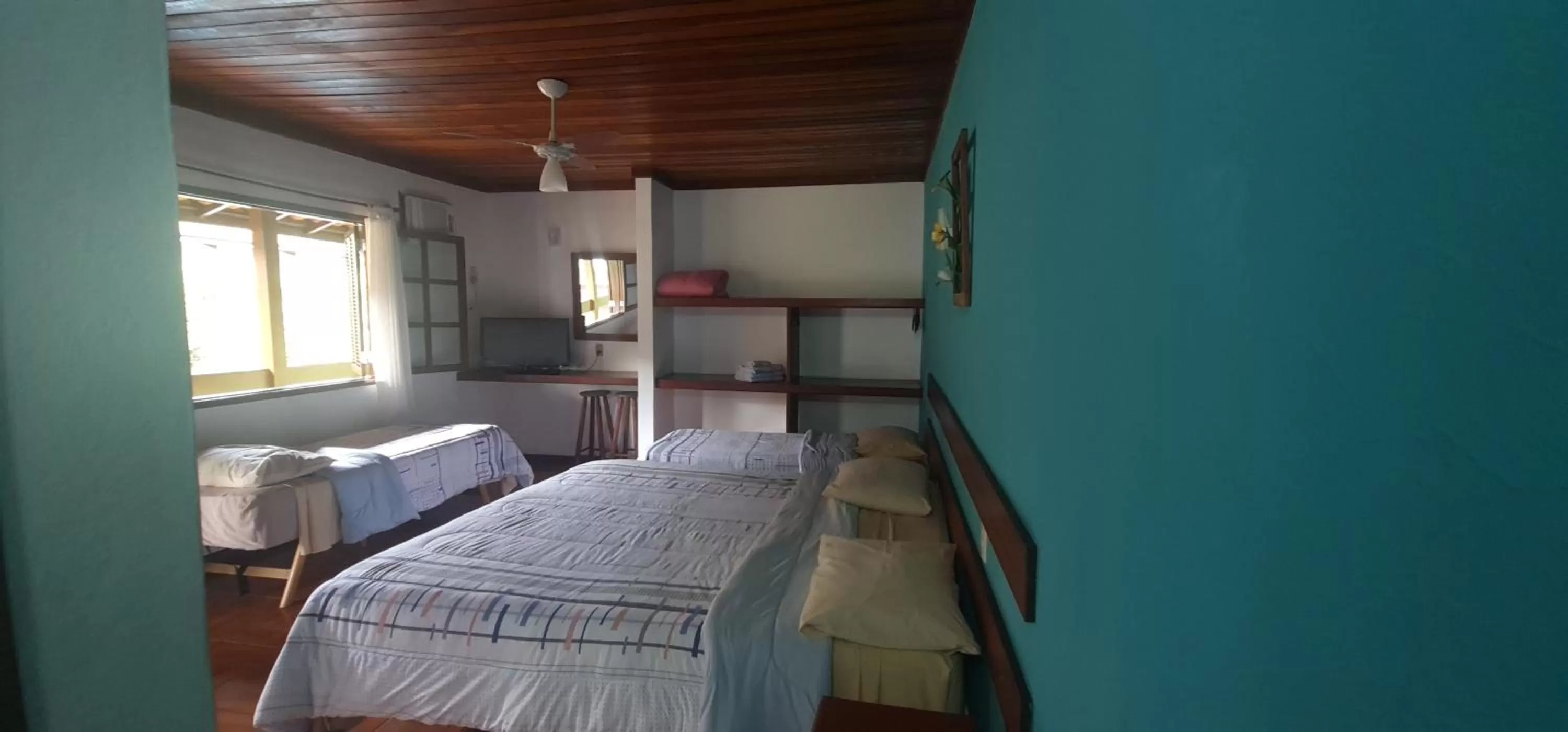 Bed in Pousada Flor de Paraty