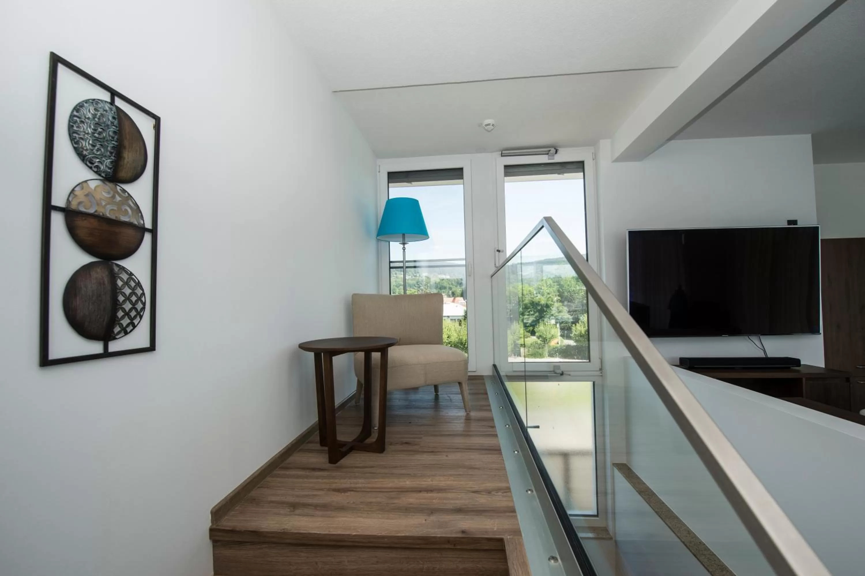 TV and multimedia in Boutiquehotel Wörthersee - Serviced Apartments