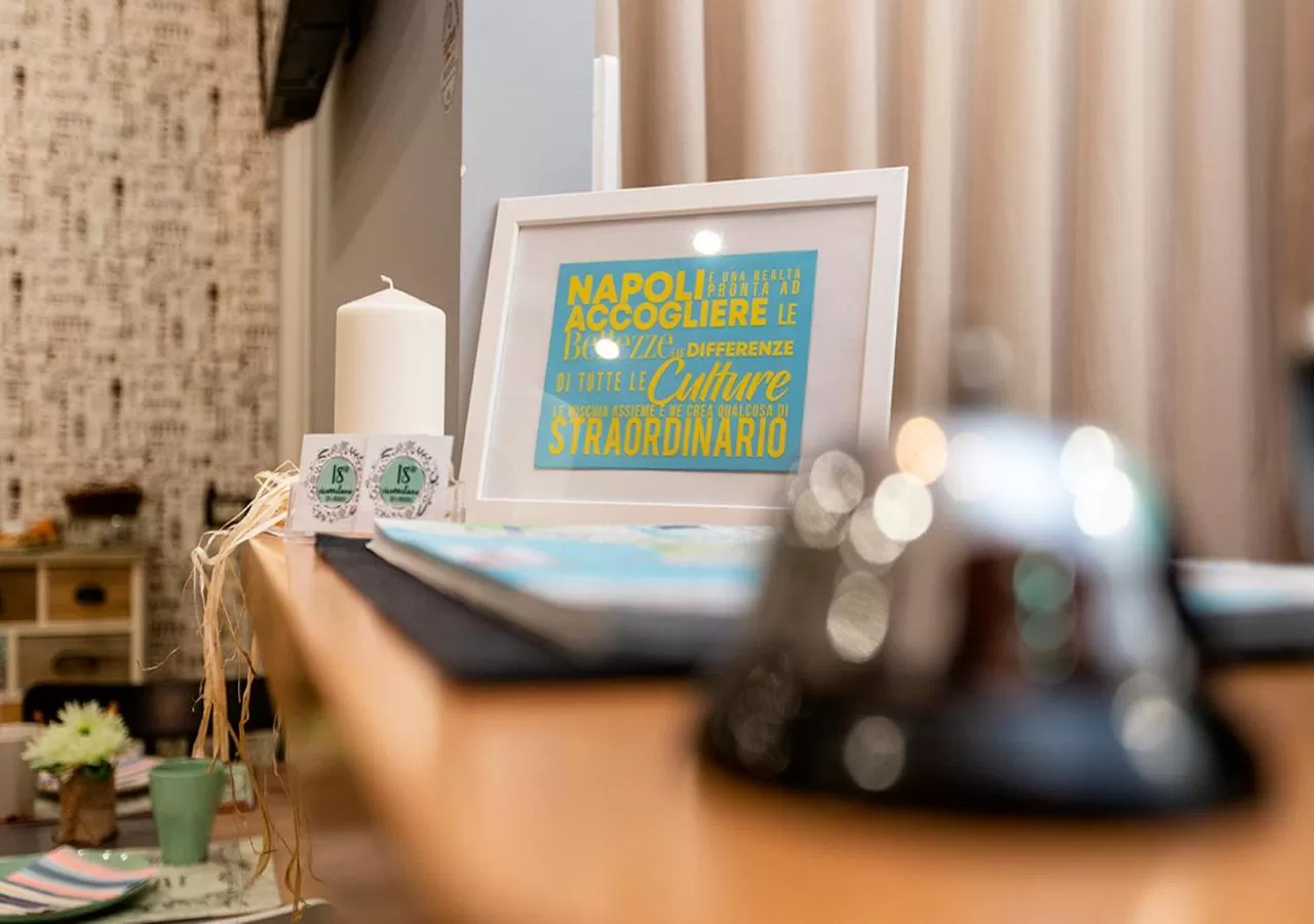 Communal lounge/ TV room in B&B Vico Milano 18