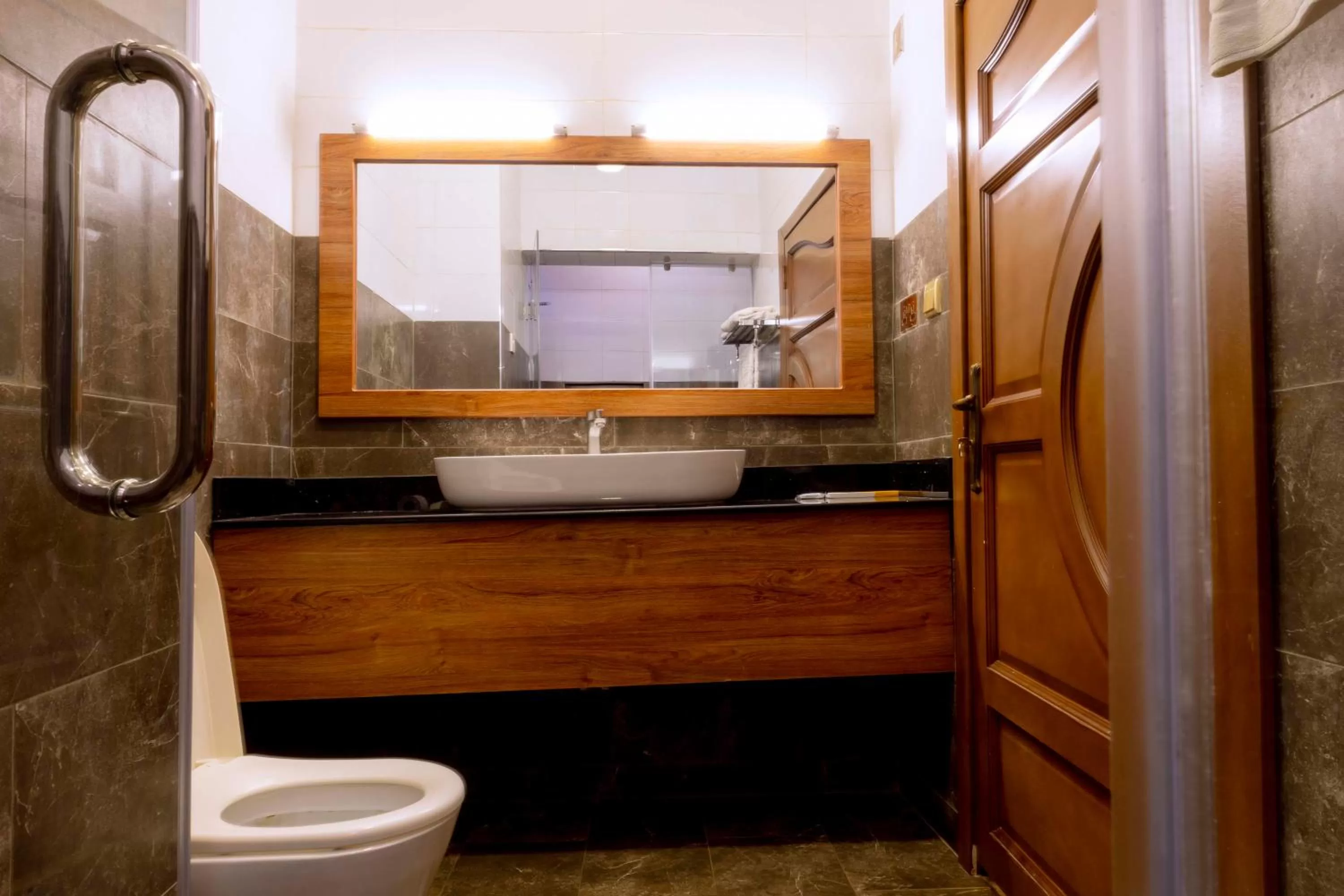 Toilet in Legend Boutique Hotel