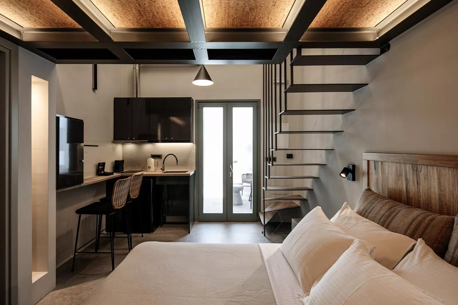 Bed in "Makava Suites" Your Luxe Urban Sanctuary