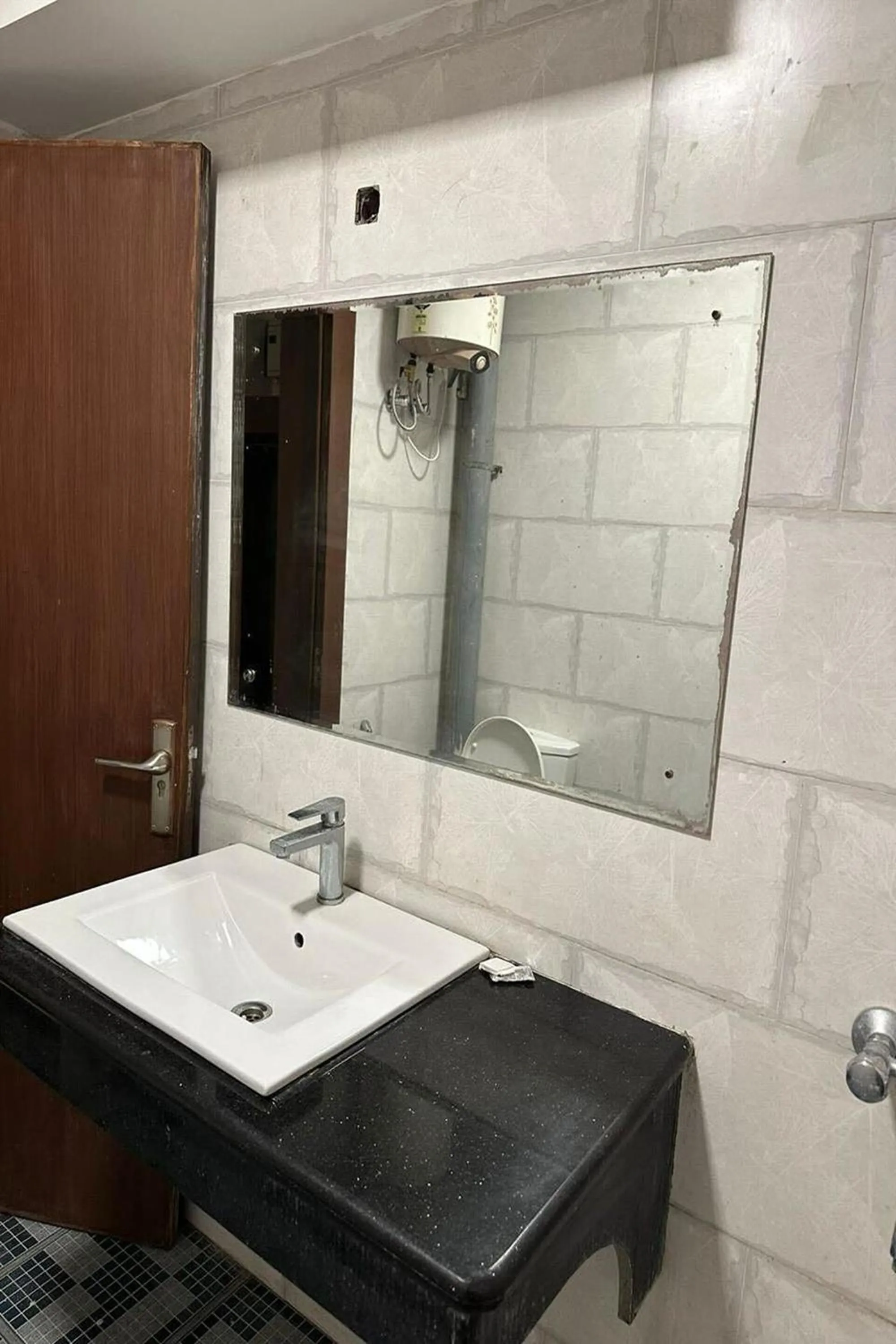 Bathroom in Hotel Amenda International