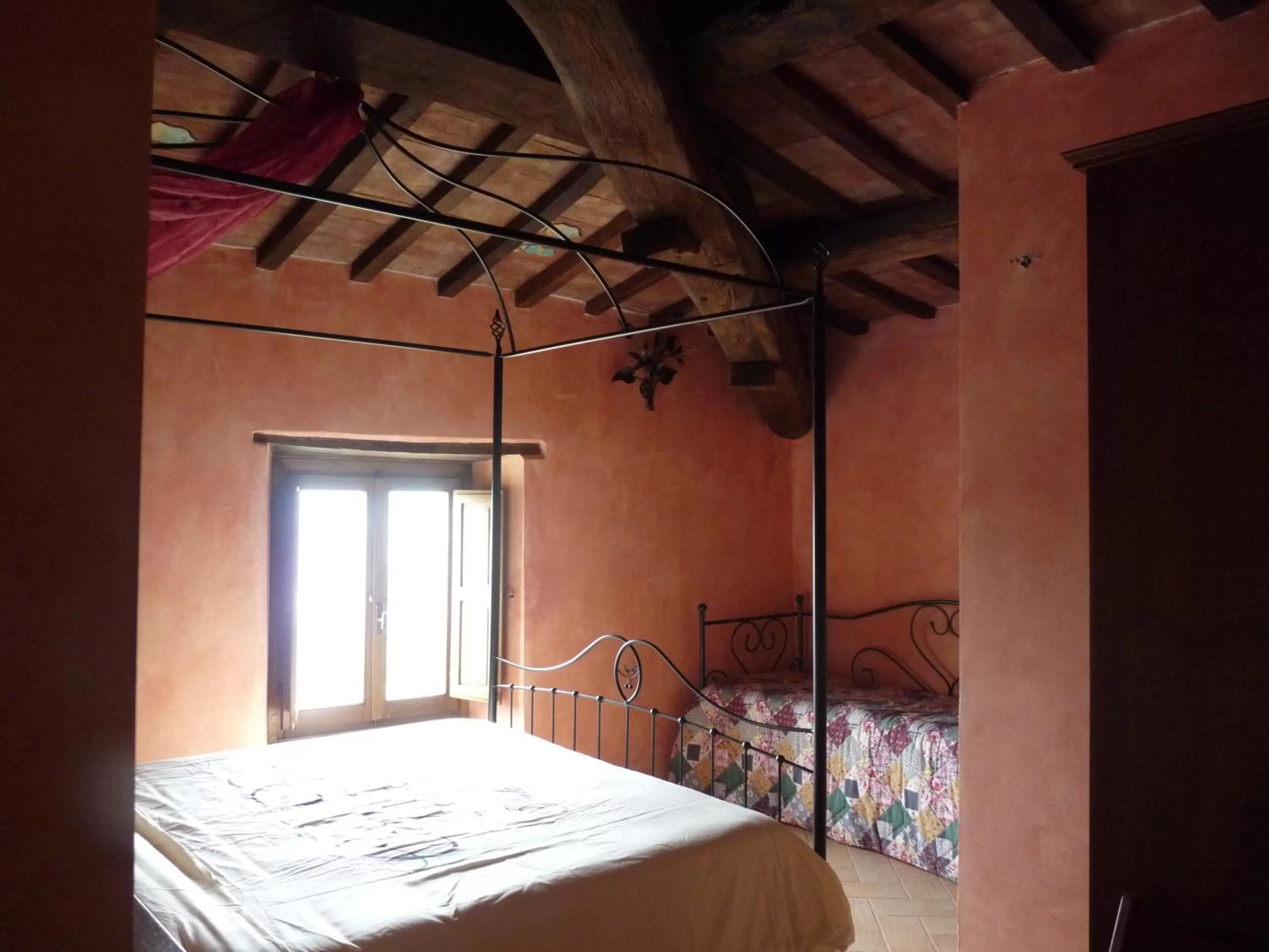 Photo of the whole room, Bed in Castello Di Giomici