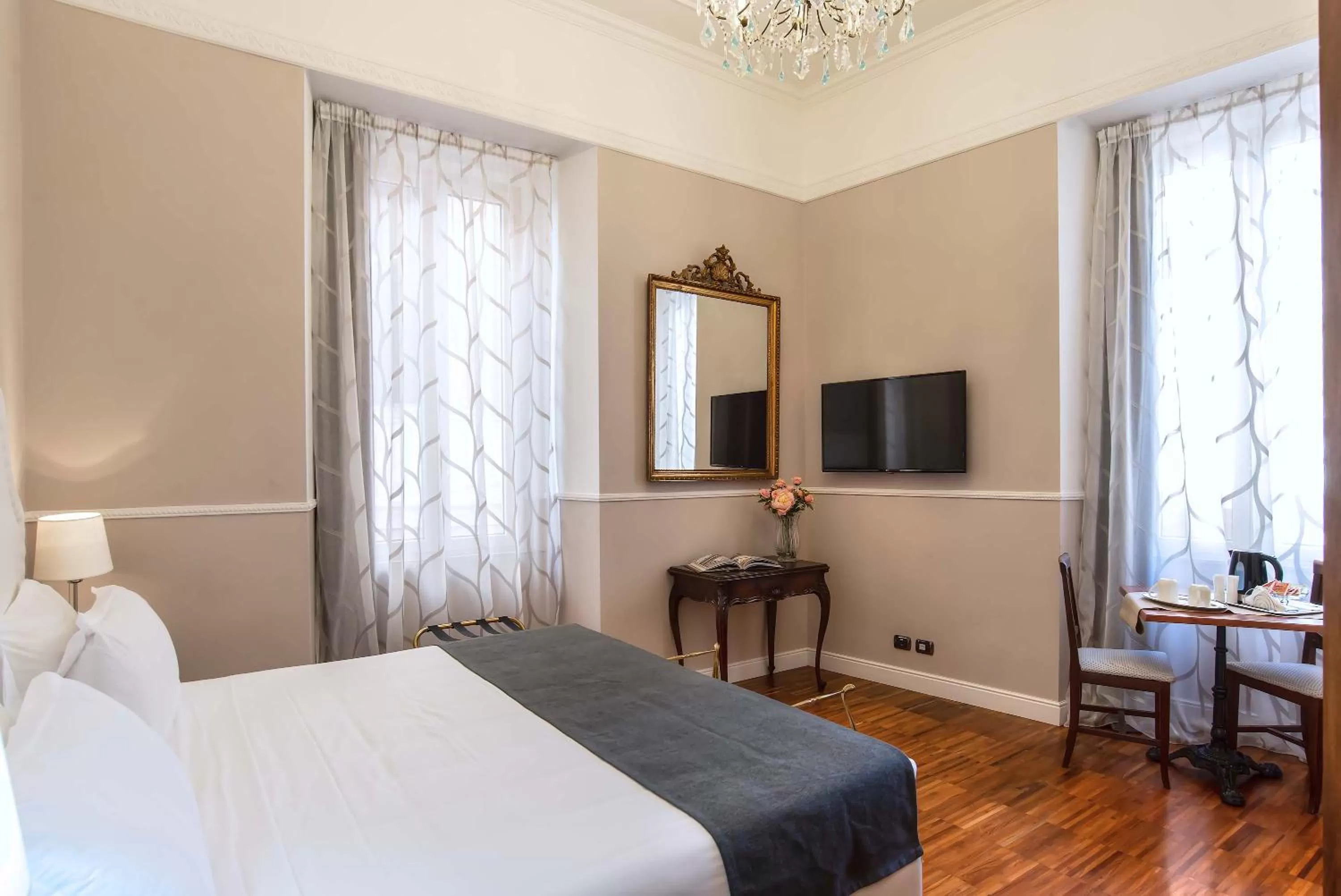Bed in I TRE MOSCHETTIERI - D'ARTAGNAN Luxury Guest House