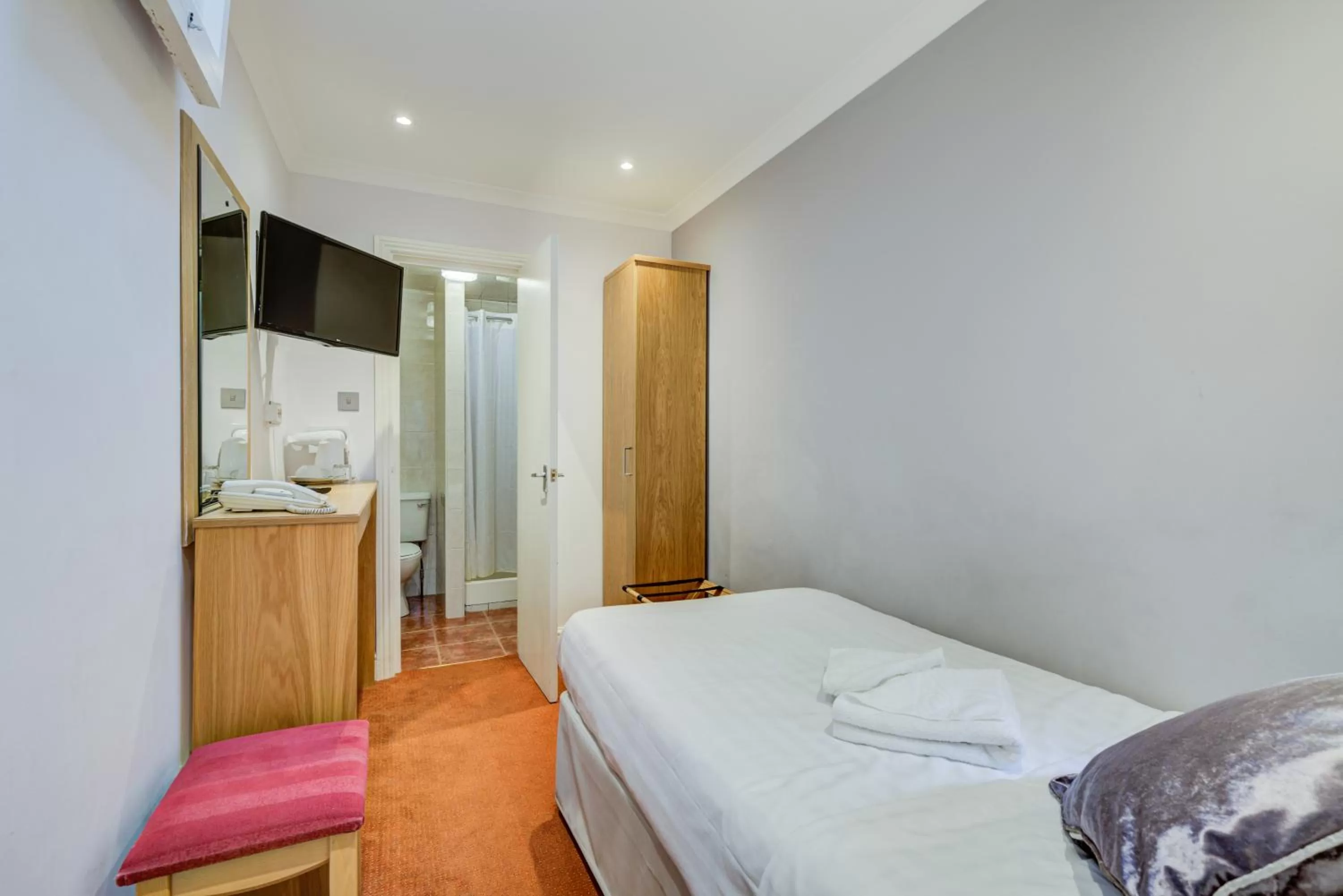 Bed in Admiral Hotel at Park Avenue