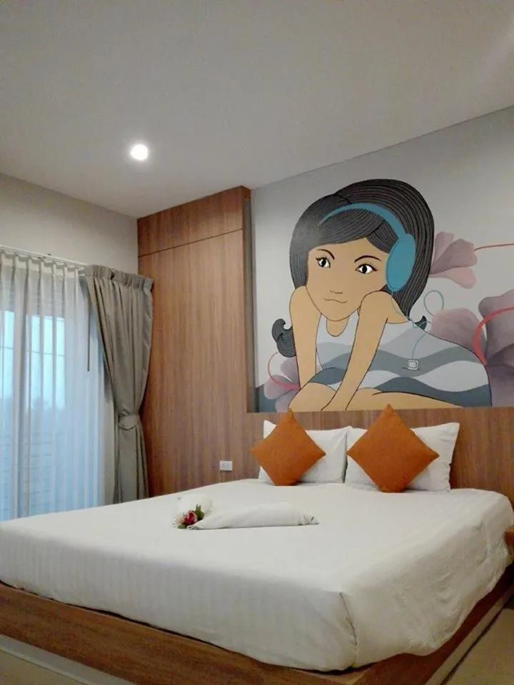 Bed in Tairada Boutique Hotel