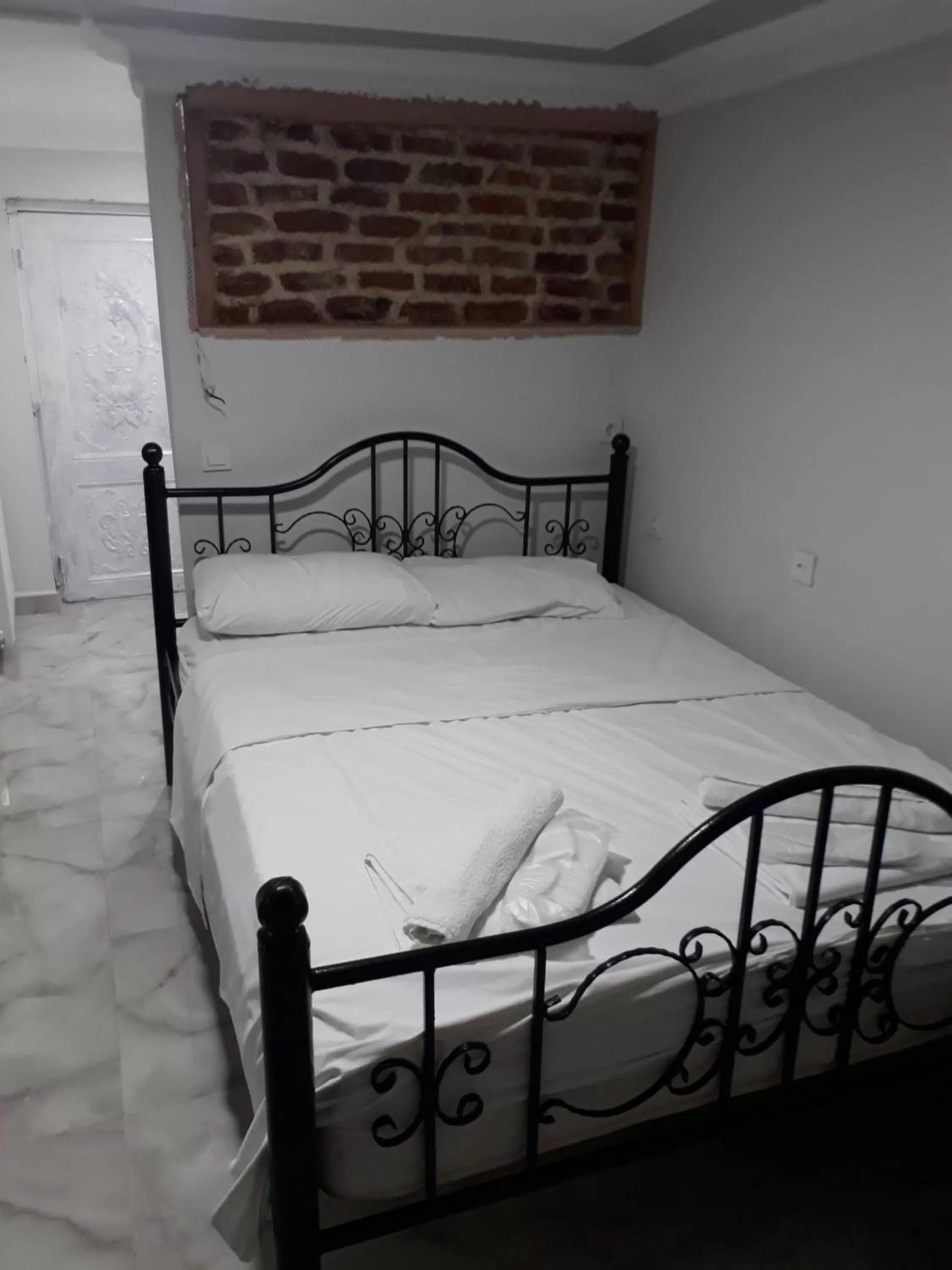 Bed in Arat Apartments