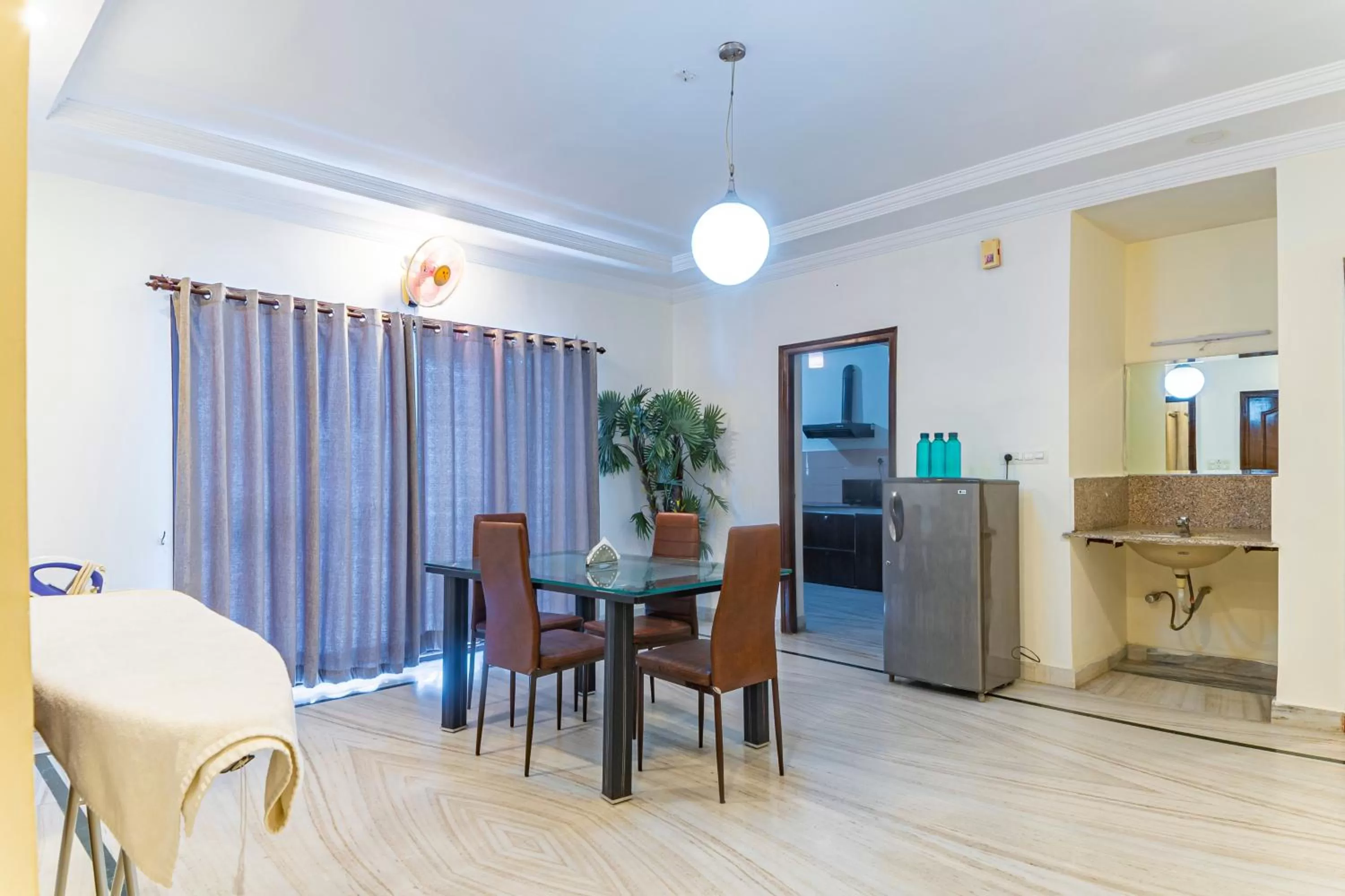 Kitchen or kitchenette in Hotel Athome & Serviced Apartments by Deccan Serai Hotels