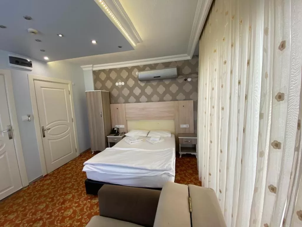 Photo of the whole room, Bed in Sakran Hotel