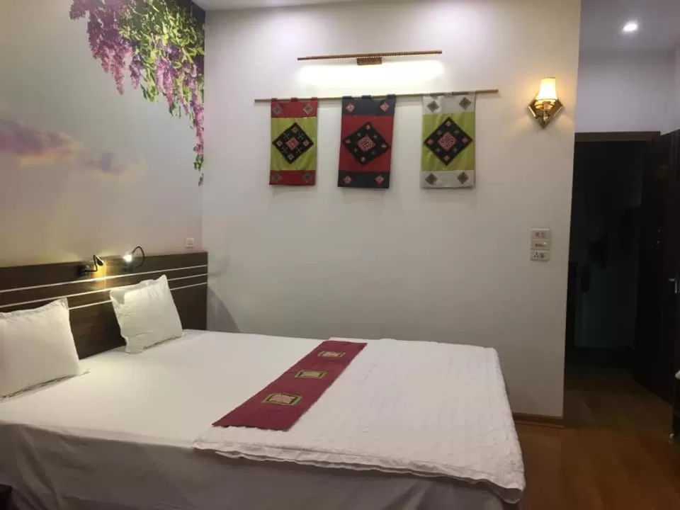 Bed in Friendly Home Hotel