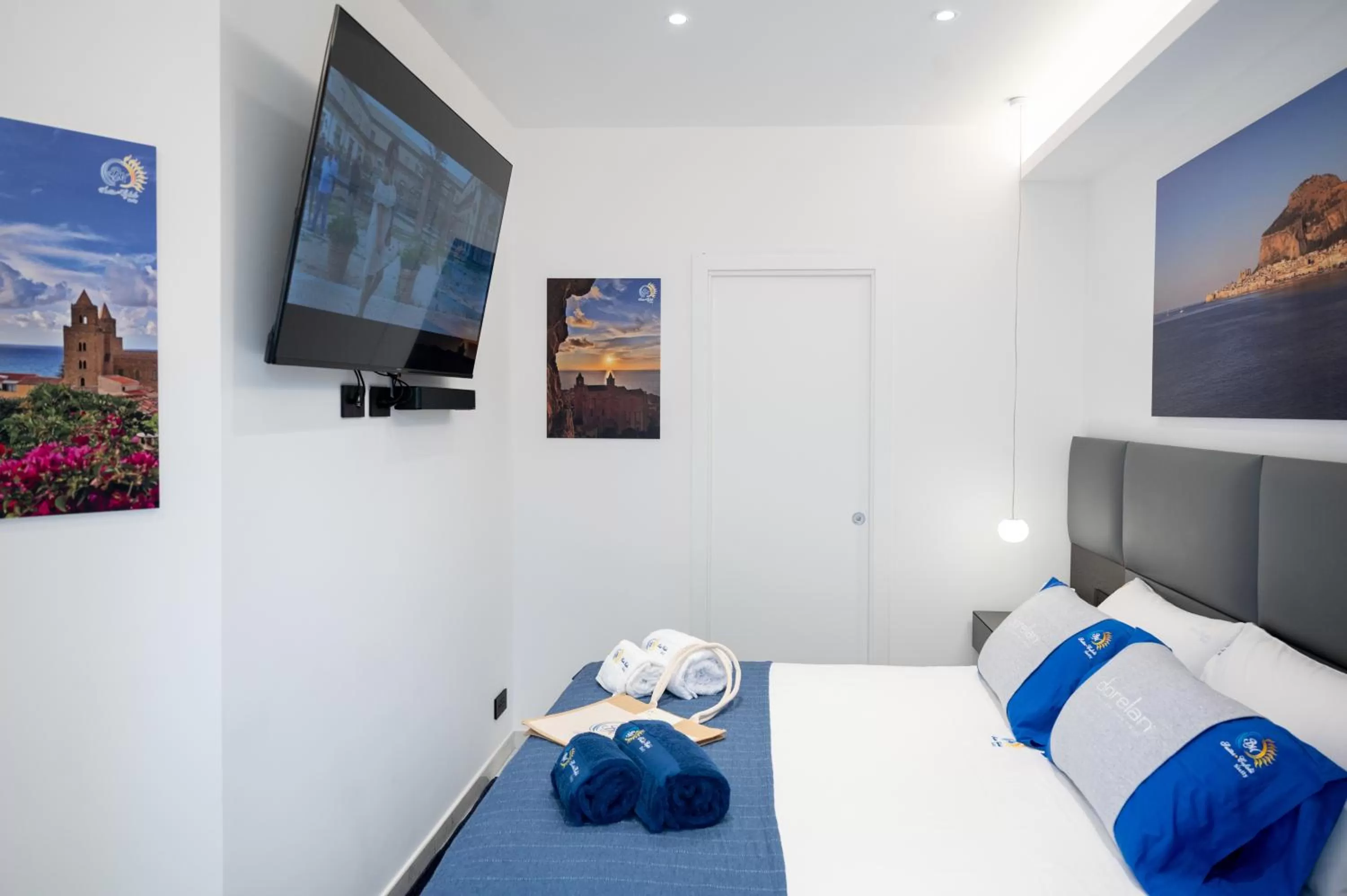 Photo of the whole room, Bed in BM SUITES CEFALU