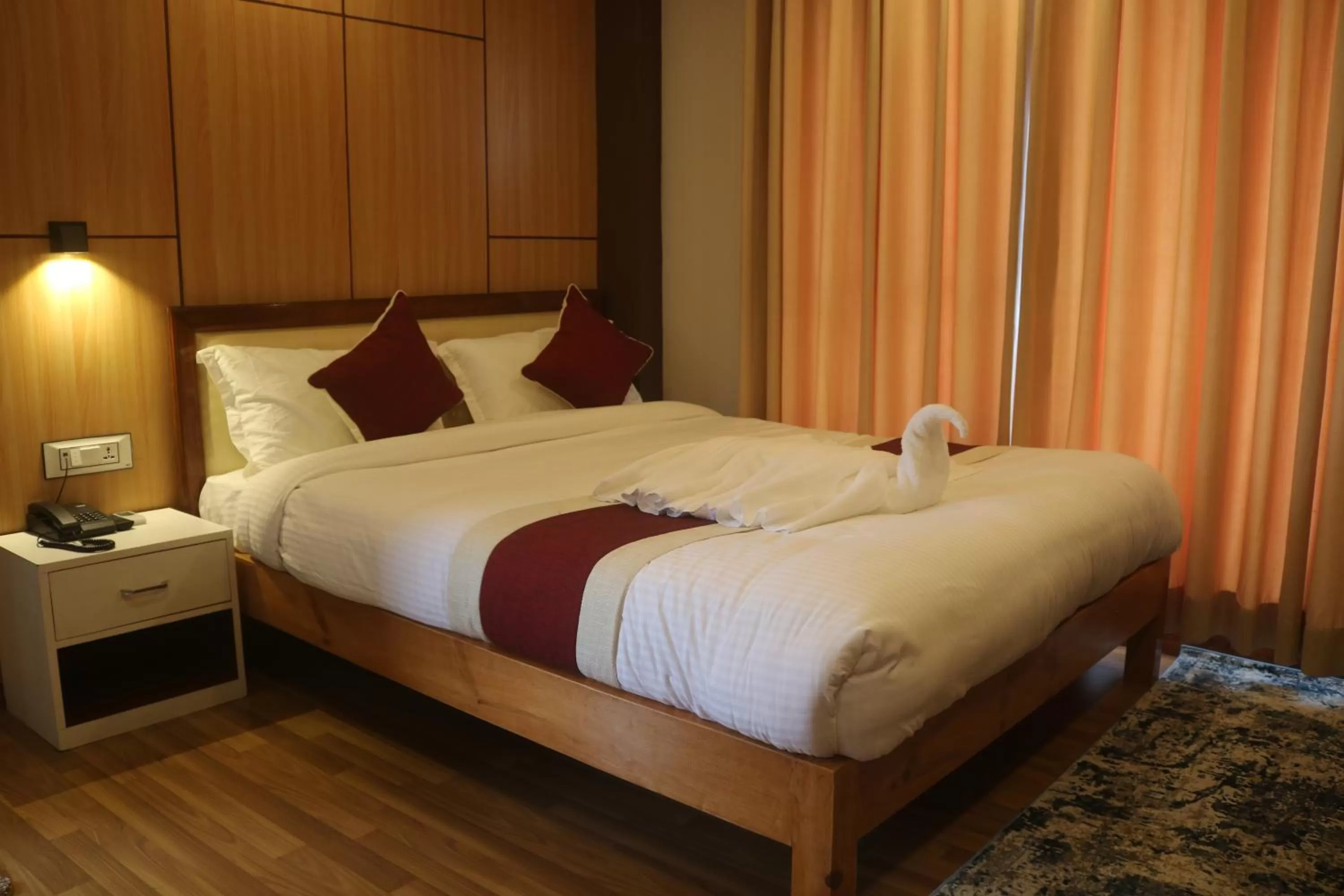 Bedroom, Bed in Hotel Family Ties Pvt. Ltd.