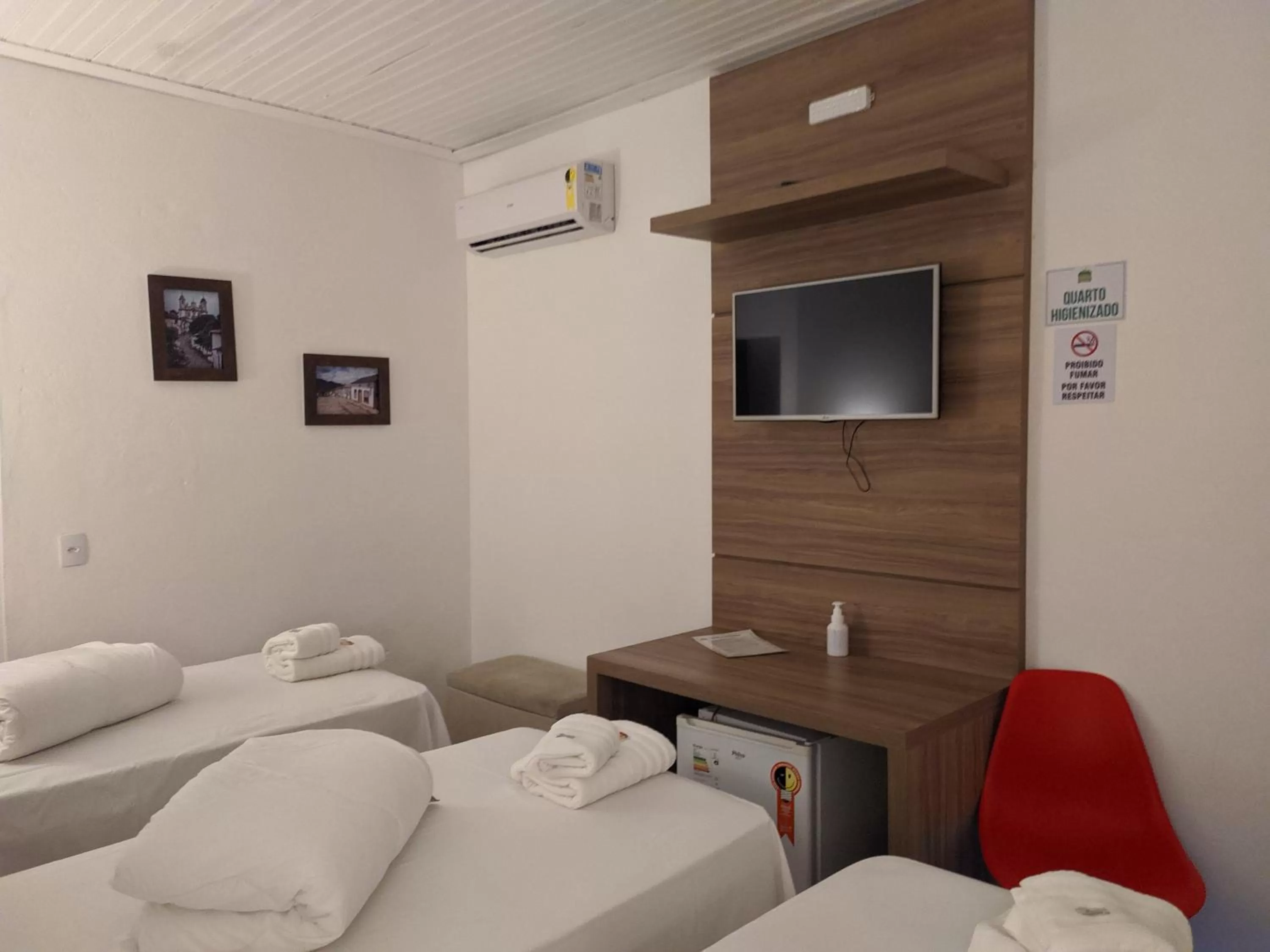 Bed in Pousada o Amanhecer