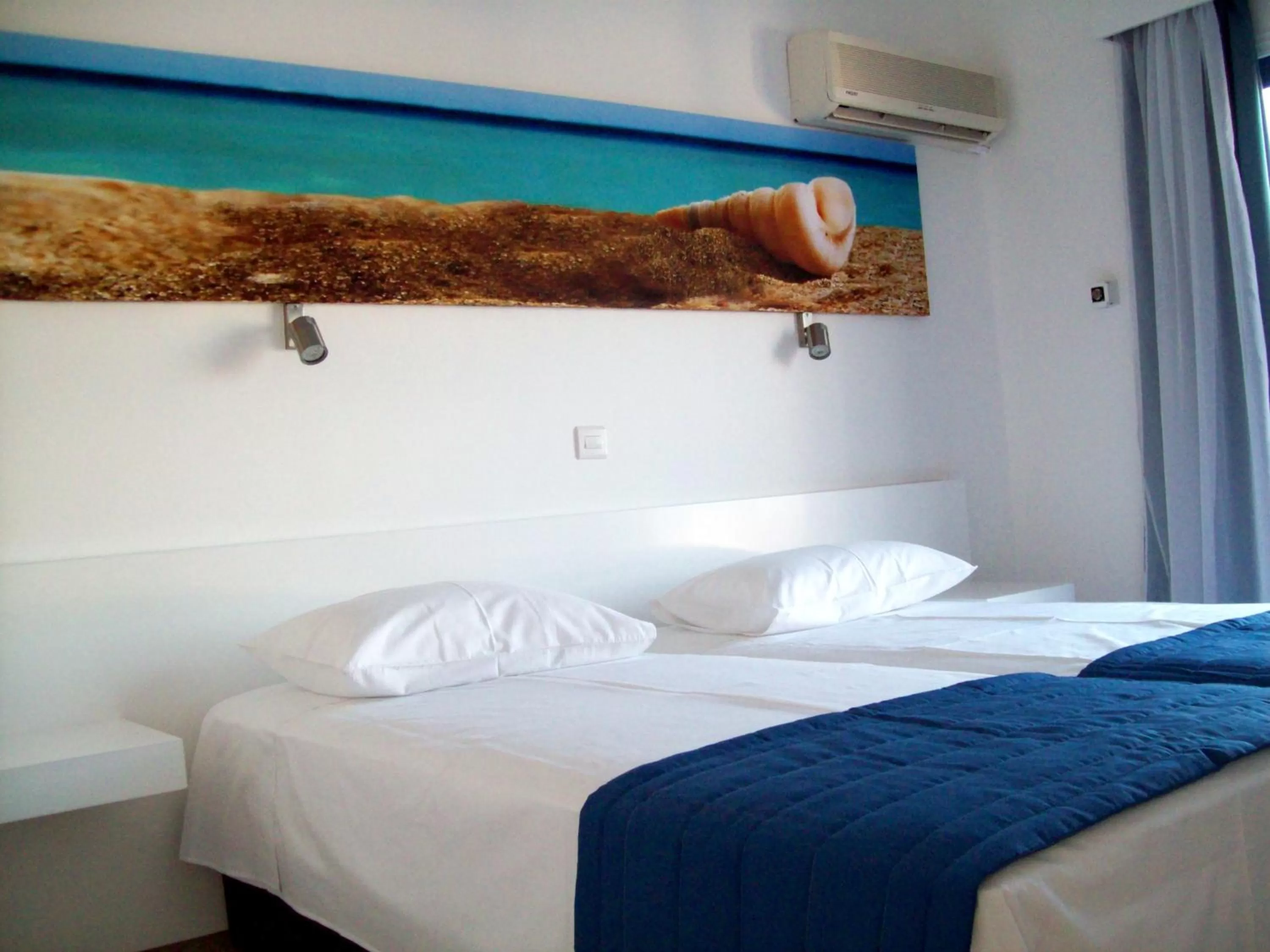 Bed in Flokkas Hotel Apartments