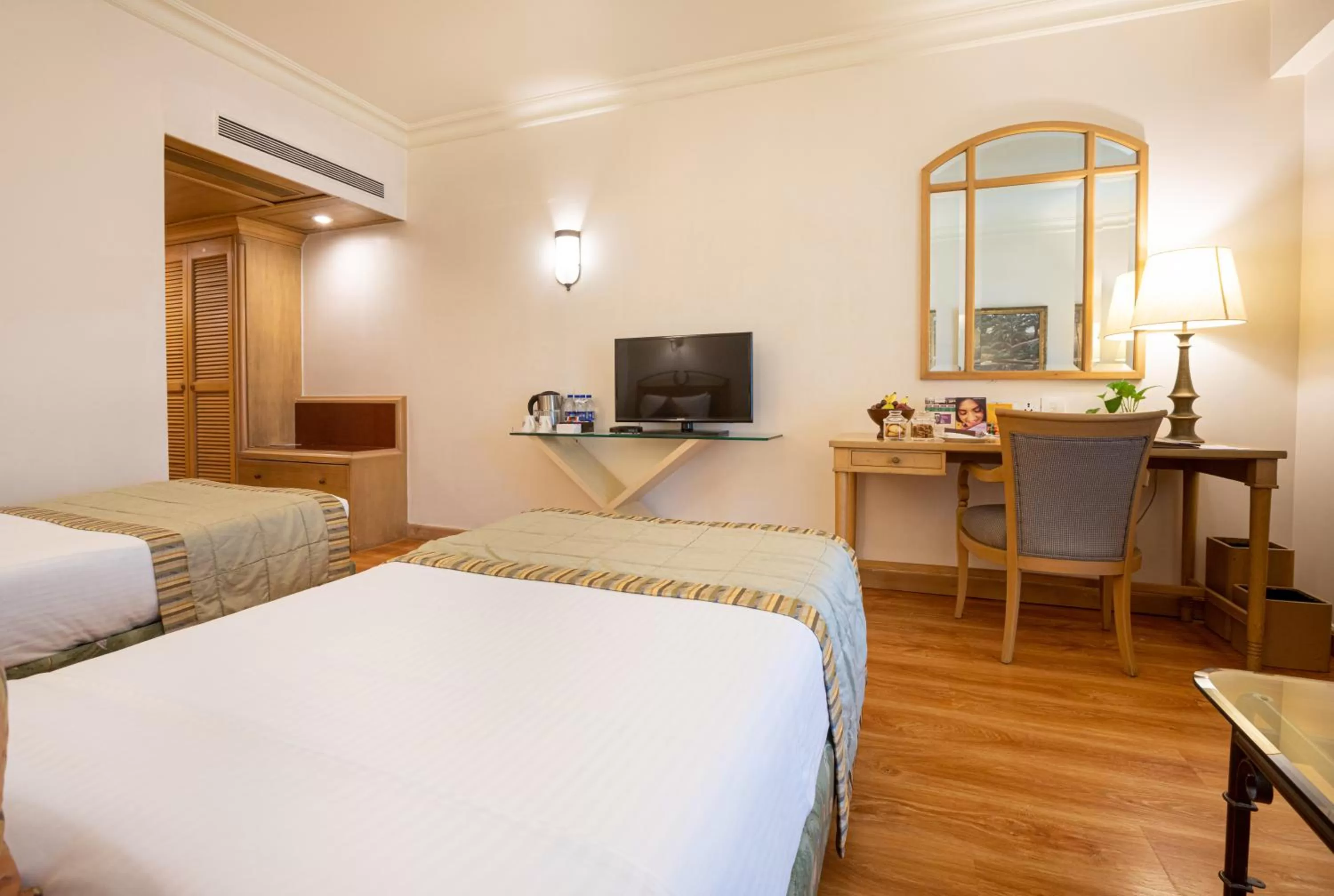 Bed in The Orchid Hotel Mumbai Vile Parle