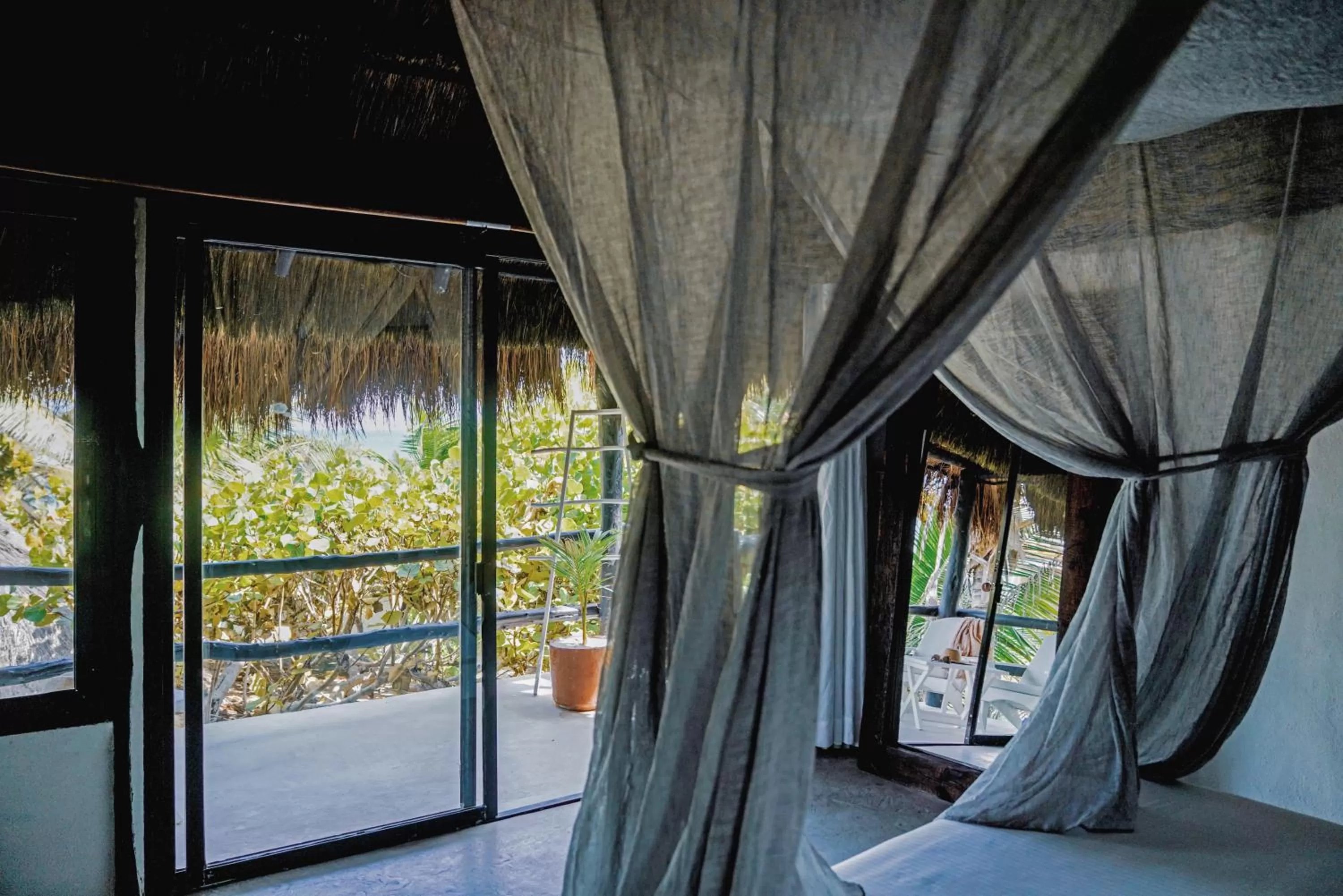 Bed in Coco Tulum Zen Zone Hotel