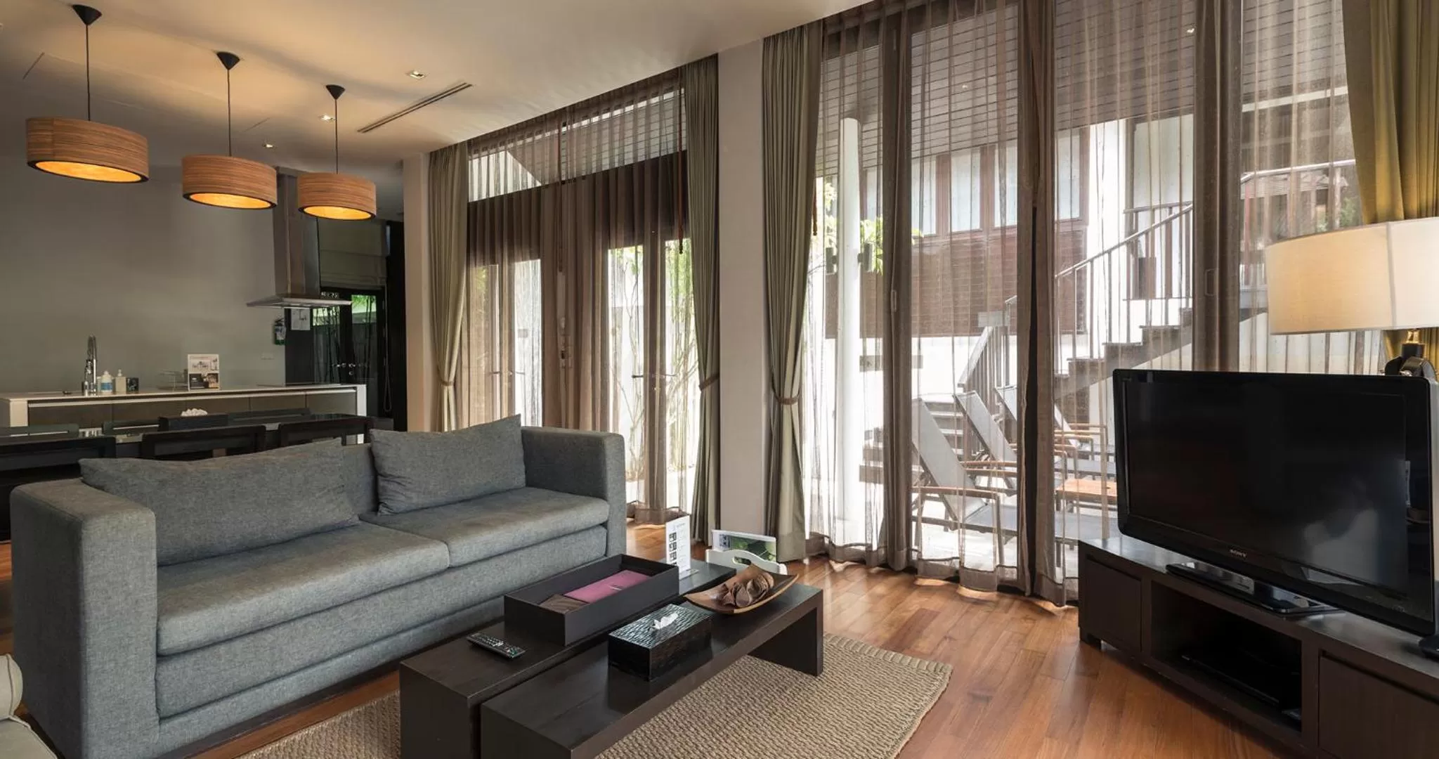 Seating area in The Sea Koh Samui Resort and Residences by Tolani