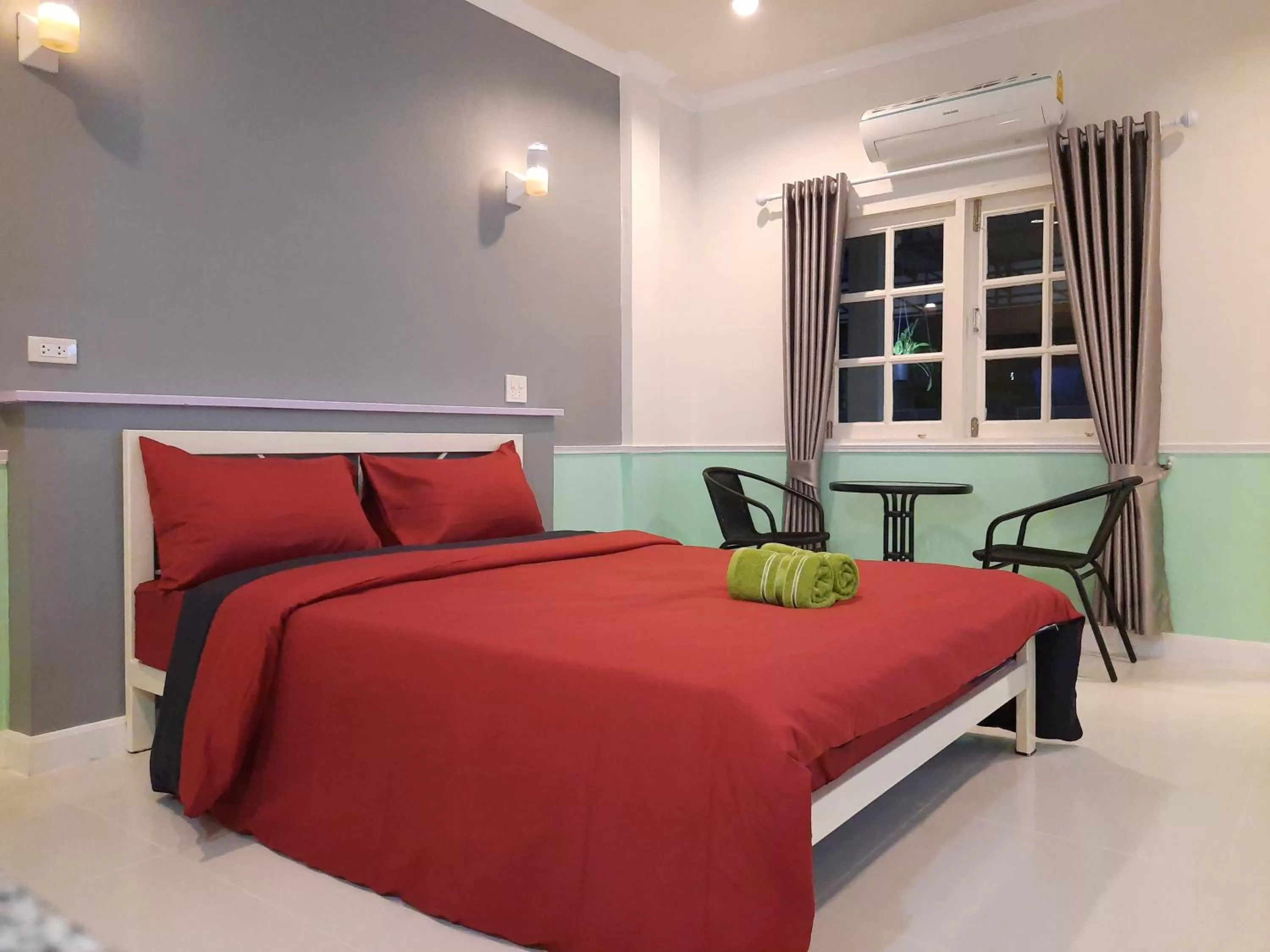 Bed in Fancy Carp Resort Hua-Hin