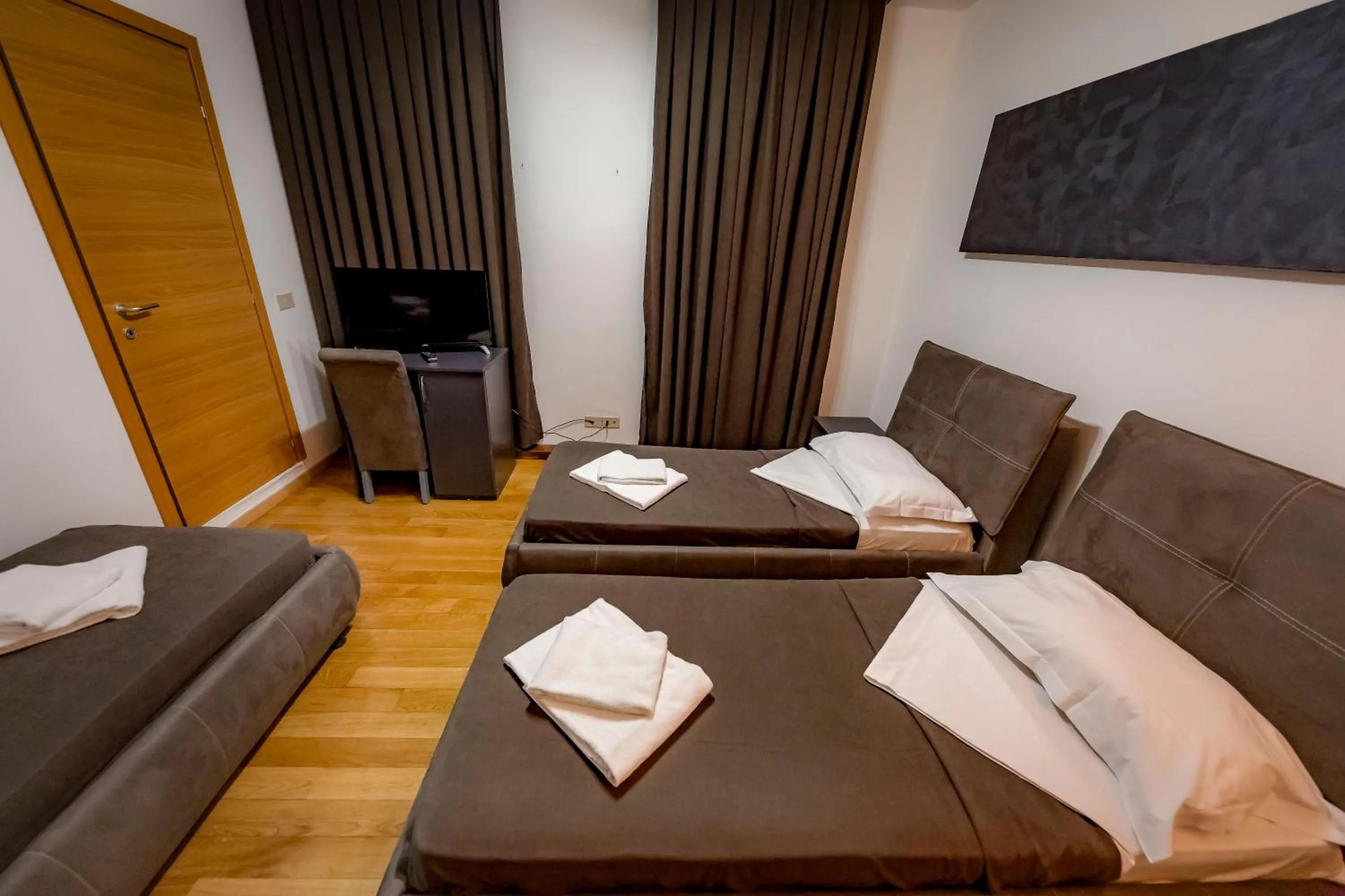 Bed in Hotel Trieste