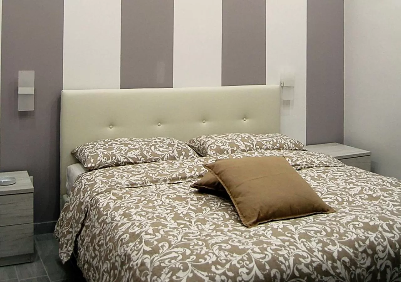 Bed in B&b Vittorio Emanuele II