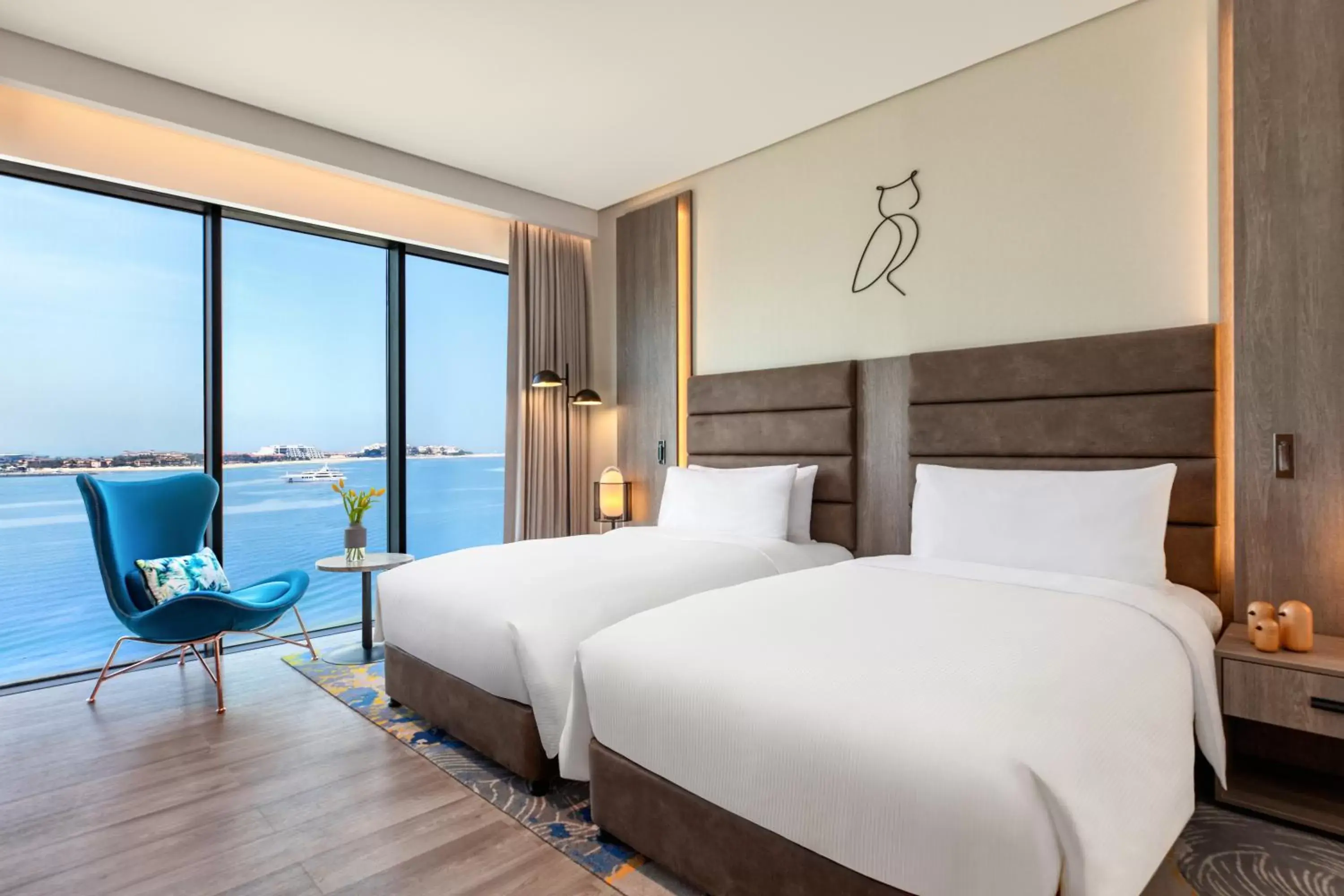Deluxe Twin Room with Beachfront View in voco Dubai The Palm by IHG Deluxe Twin Room with Beachfront View in voco Dubai The Palm by IHG