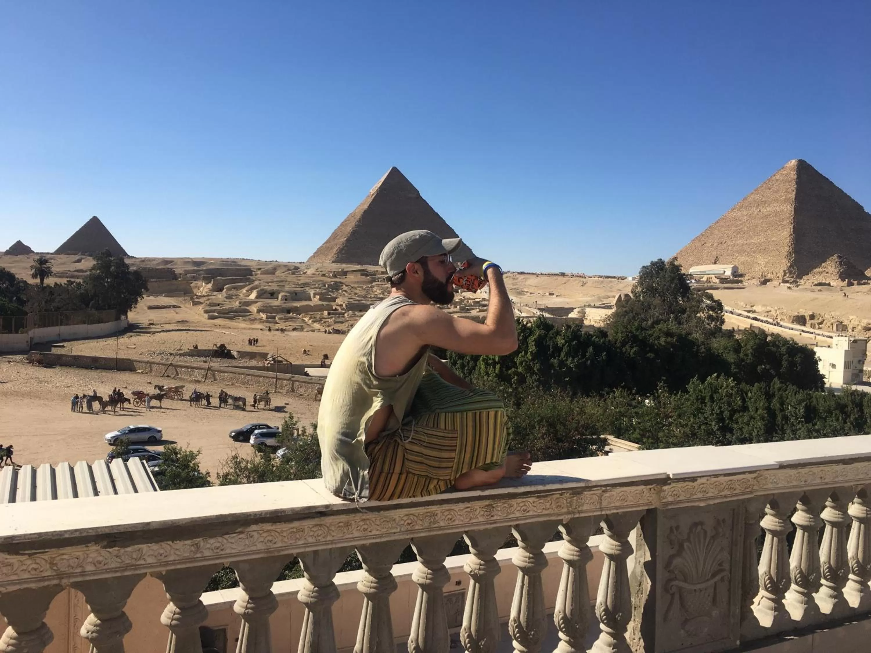 Sphinx palace pyramids view