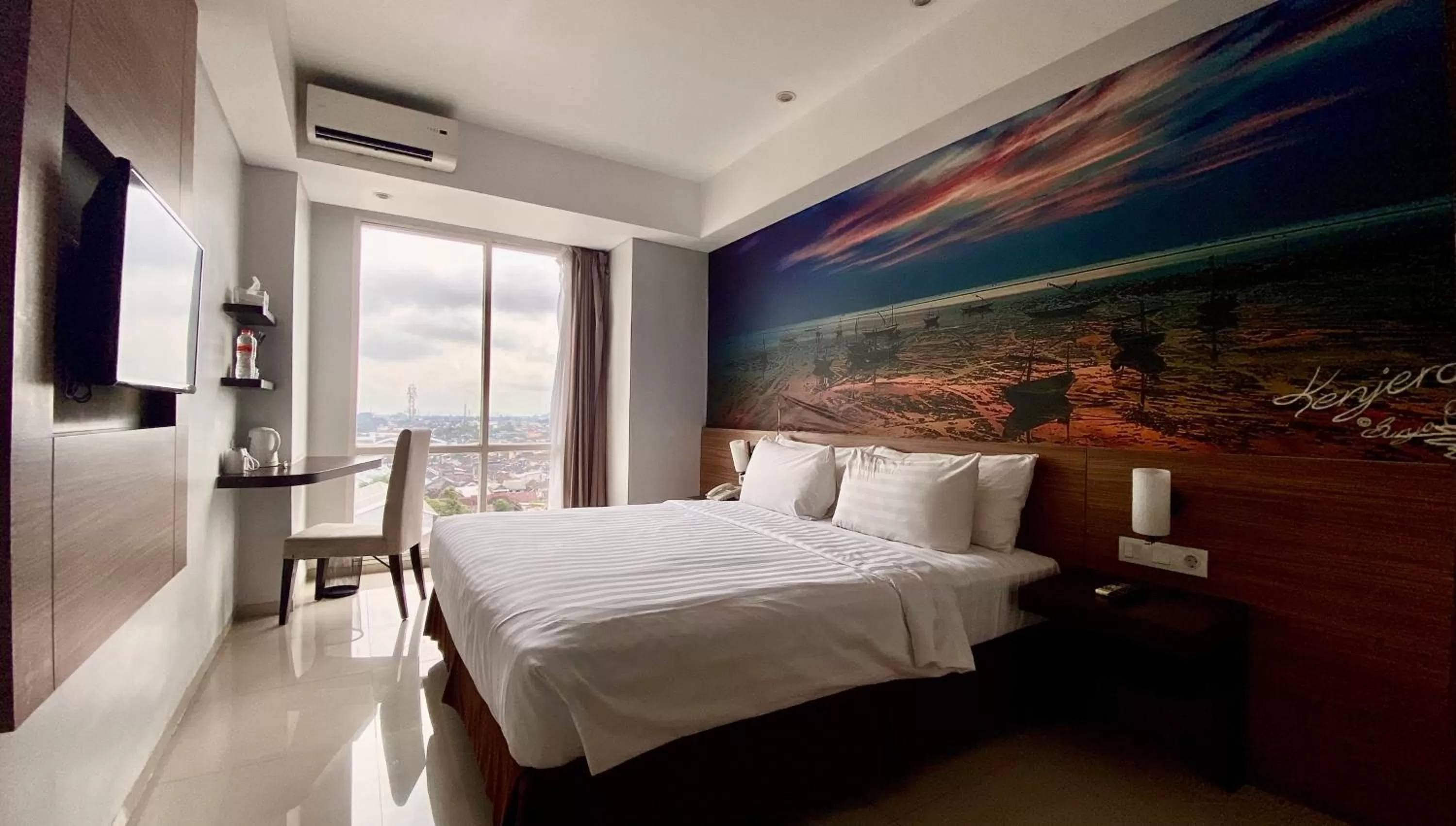 Bed in Ascent Premiere Hotel and Convention