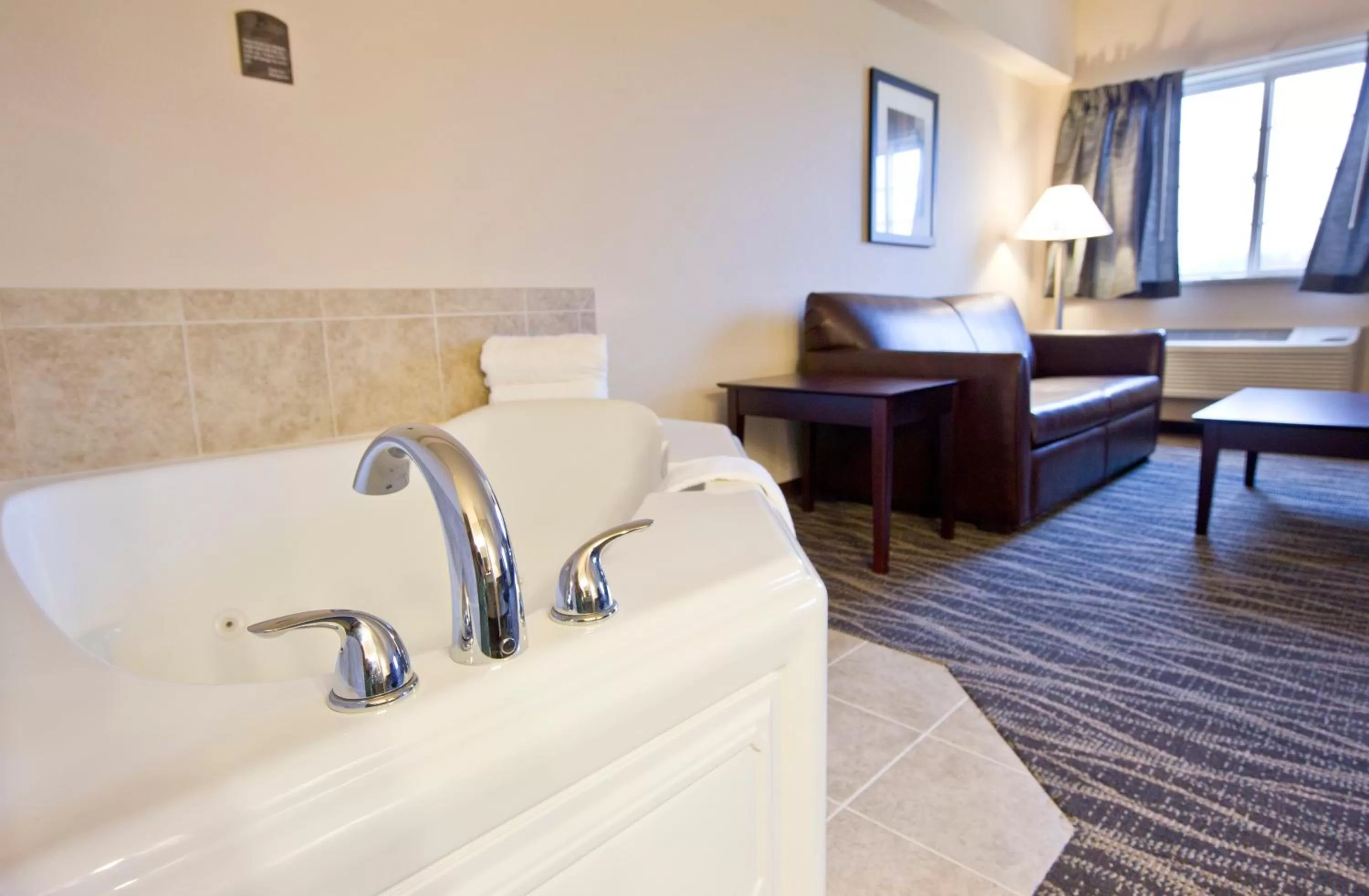 Bed in Cobblestone Inn & Suites - Boone