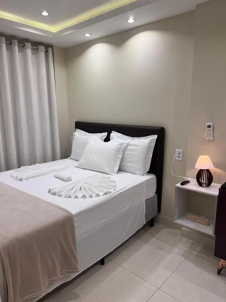 Bed in Pousada Arraial Tropical