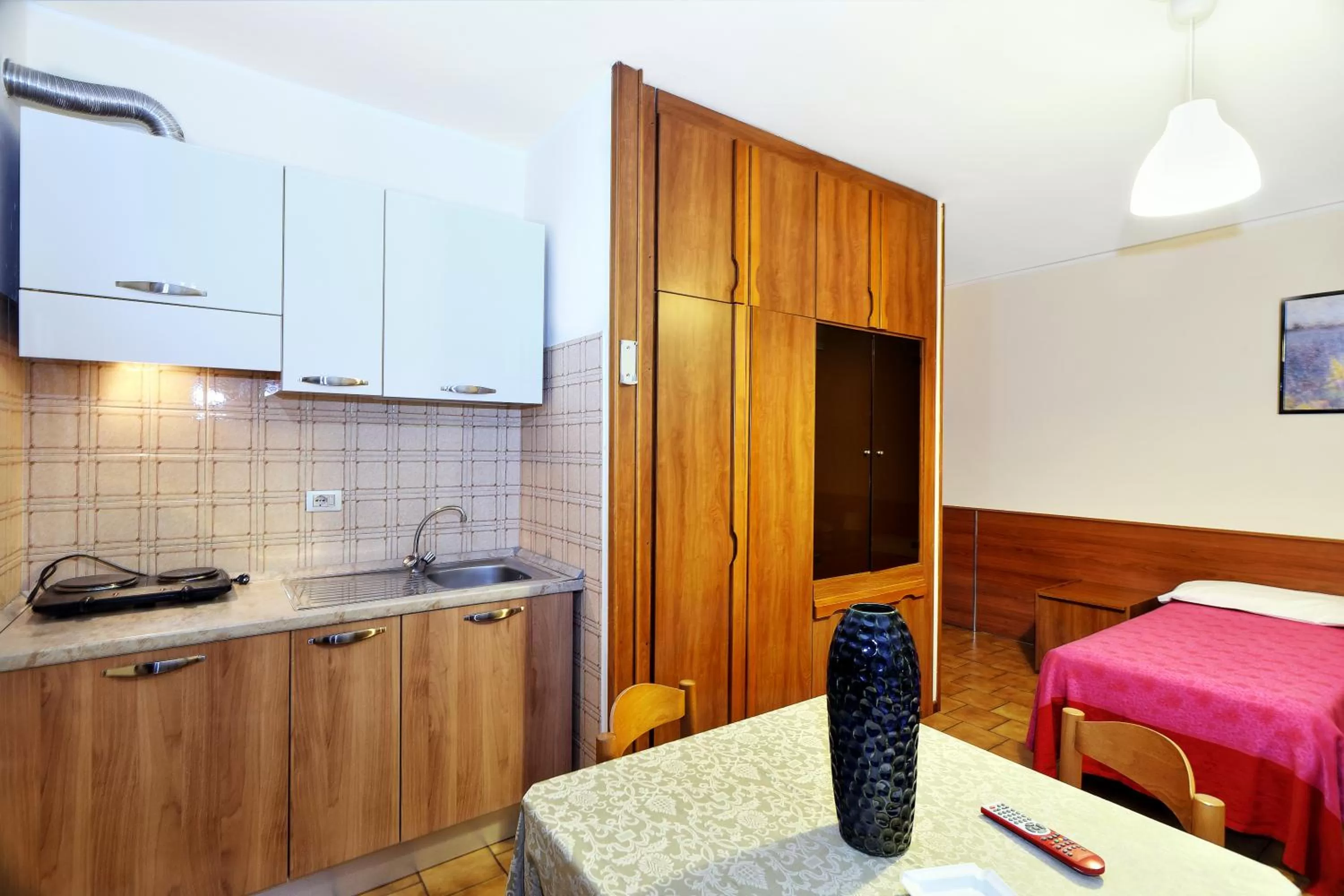 Kitchen or kitchenette, Bed in Hotel Residence Sogno