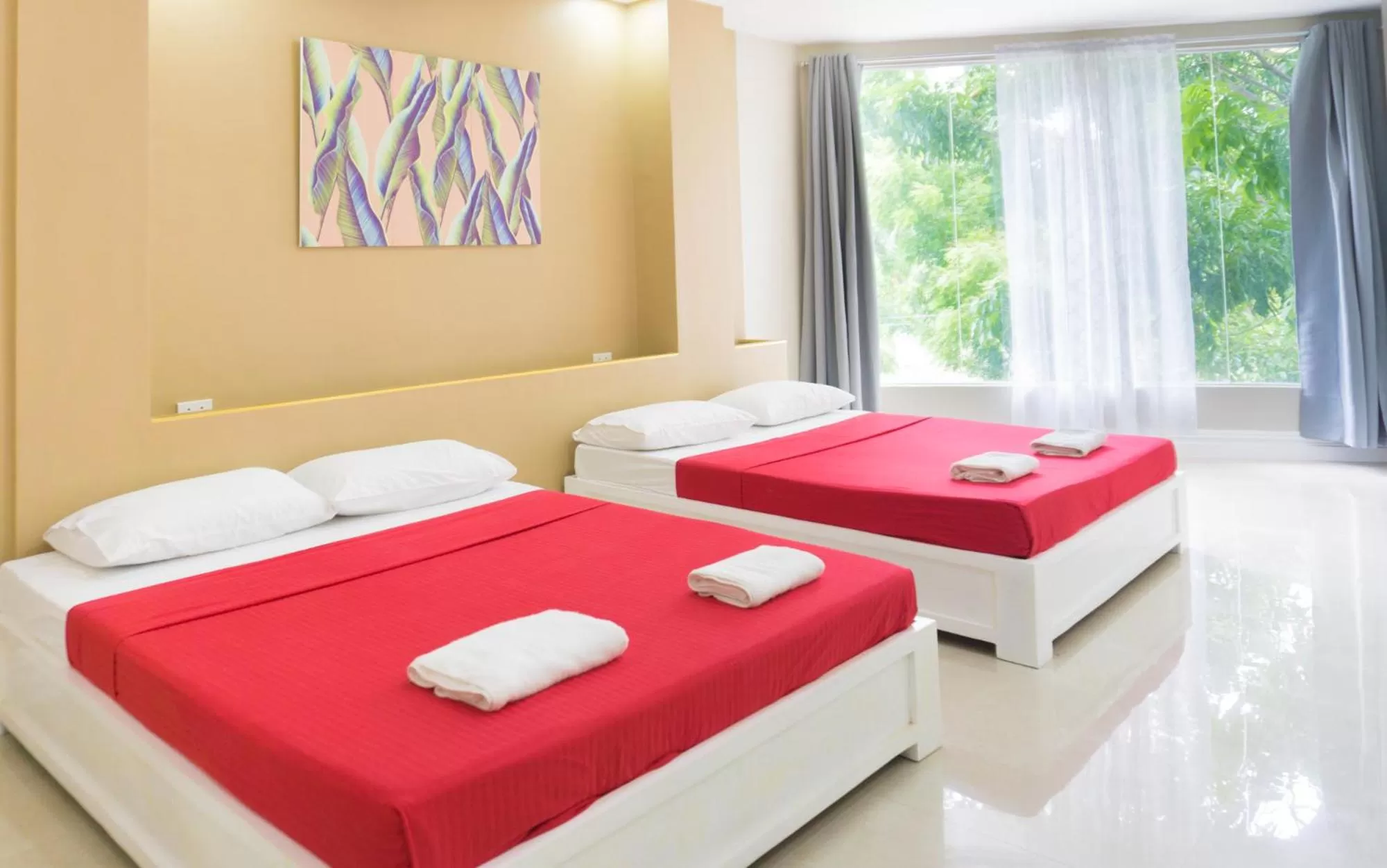 Bed in Sandscape Hotel