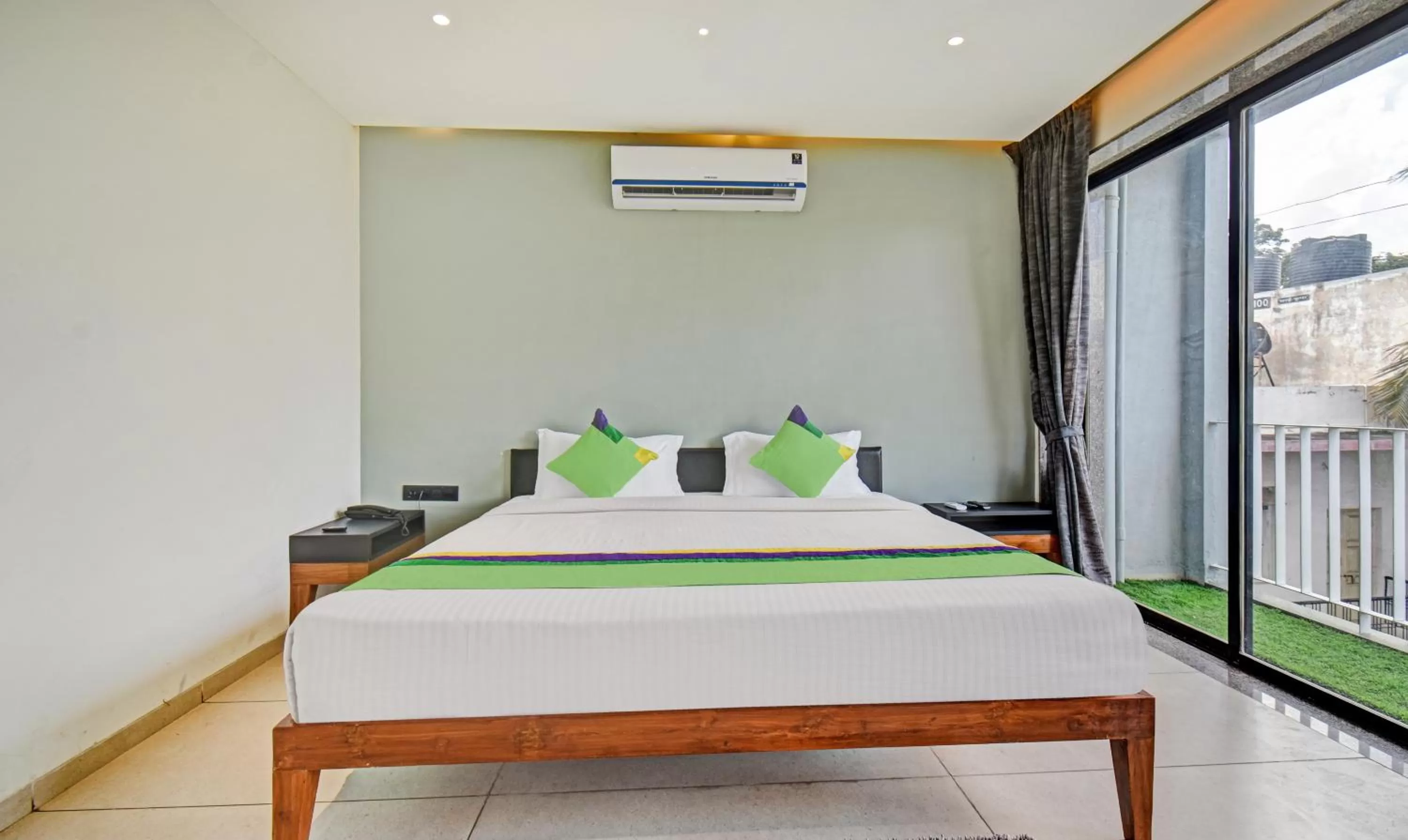 Bedroom, Bed in Treebo Aroma Executive